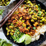 This Sheet Pan Red Curry Vegan Beef is the perfect weeknight dinner! Served with coconut rice, crispy edamame and spicy peanut sauce | ThisSavoryVegan.com