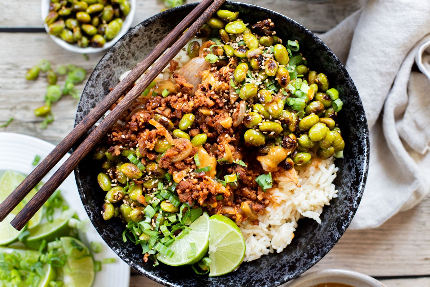 This Sheet Pan Red Curry Vegan Beef is the perfect weeknight dinner! Served with coconut rice, crispy edamame and spicy peanut sauce | ThisSavoryVegan.com