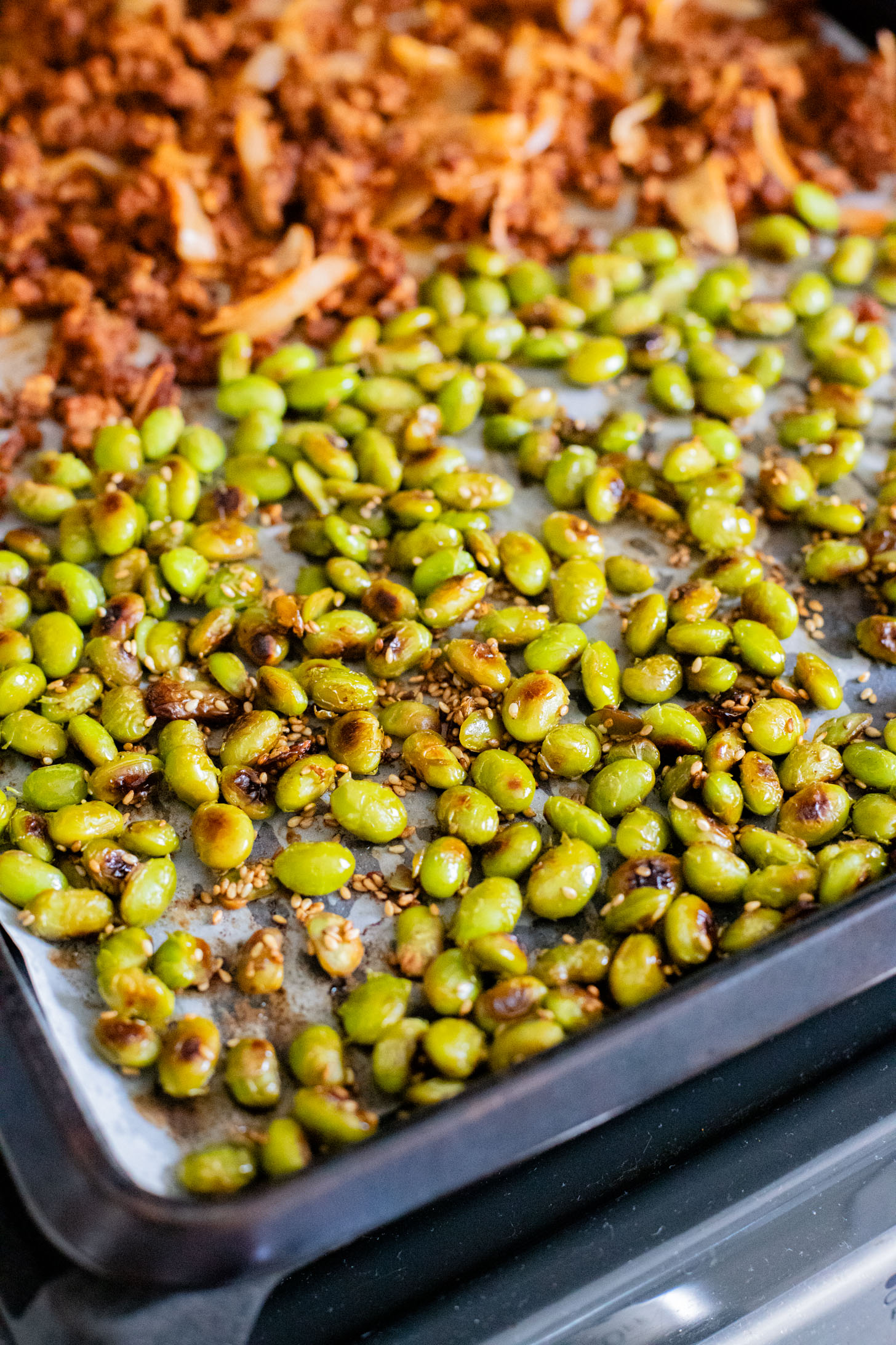 This Sheet Pan Red Curry Vegan Beef is the perfect weeknight dinner! Served with coconut rice, crispy edamame and spicy peanut sauce | ThisSavoryVegan.com
