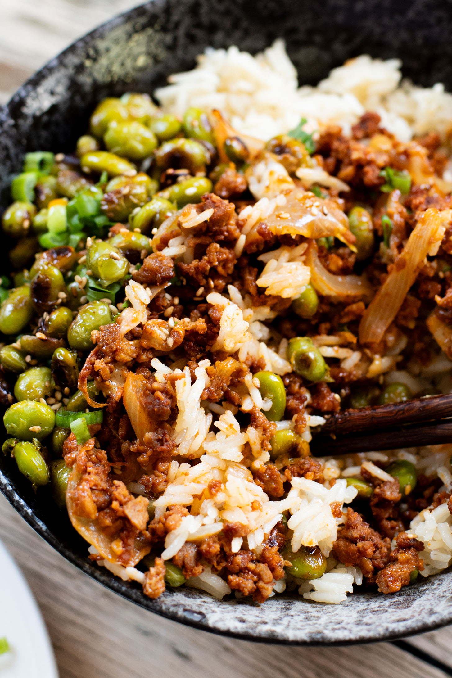 This Sheet Pan Red Curry Vegan Beef is the perfect weeknight dinner! Served with coconut rice, crispy edamame and spicy peanut sauce | ThisSavoryVegan.com
