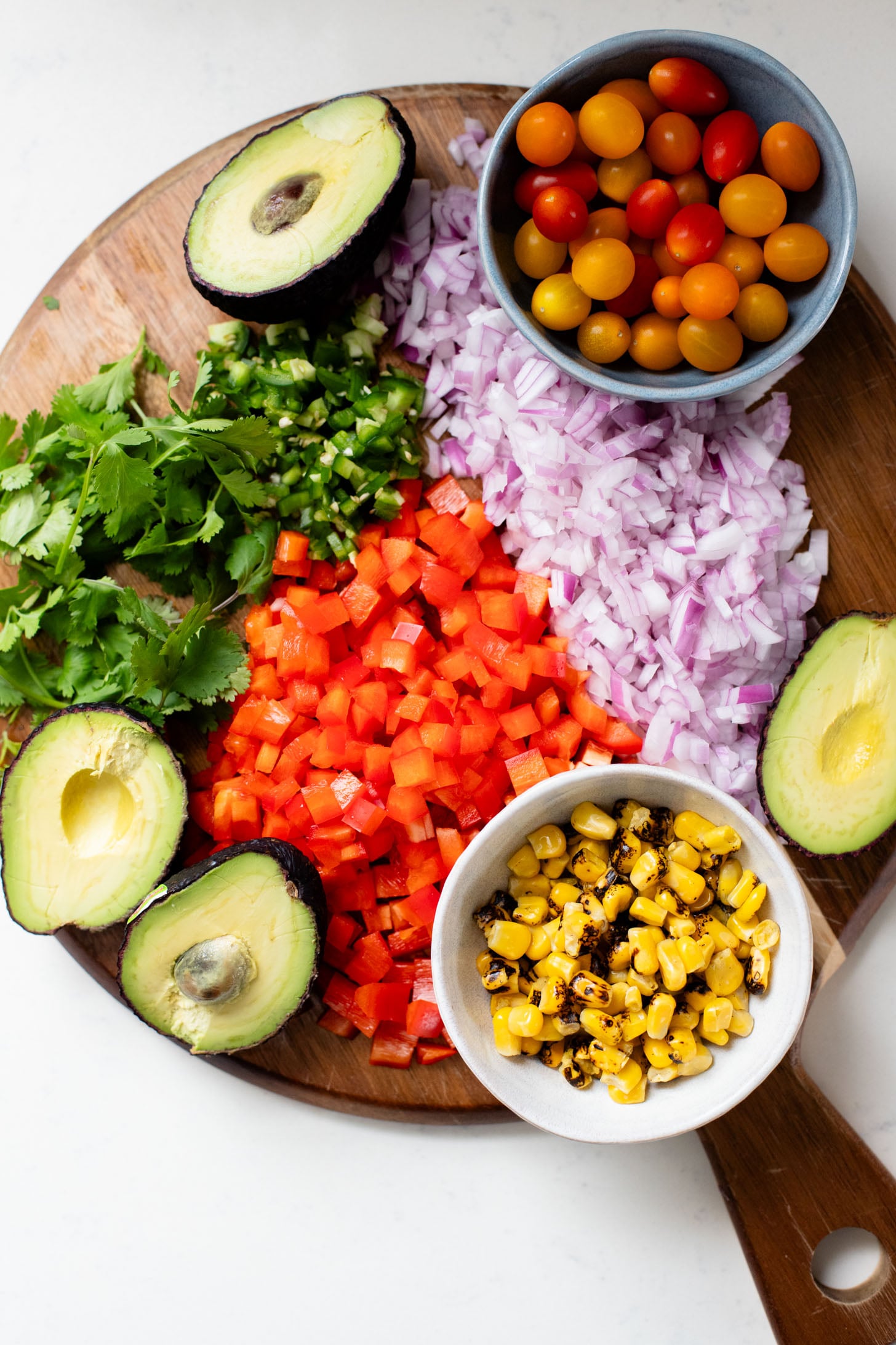 This Southwest Quinoa Salad is perfect for meal prep or a party. Packed with plant protein, plenty of veggies and a creamy sauce | ThisSavoryVegan.com