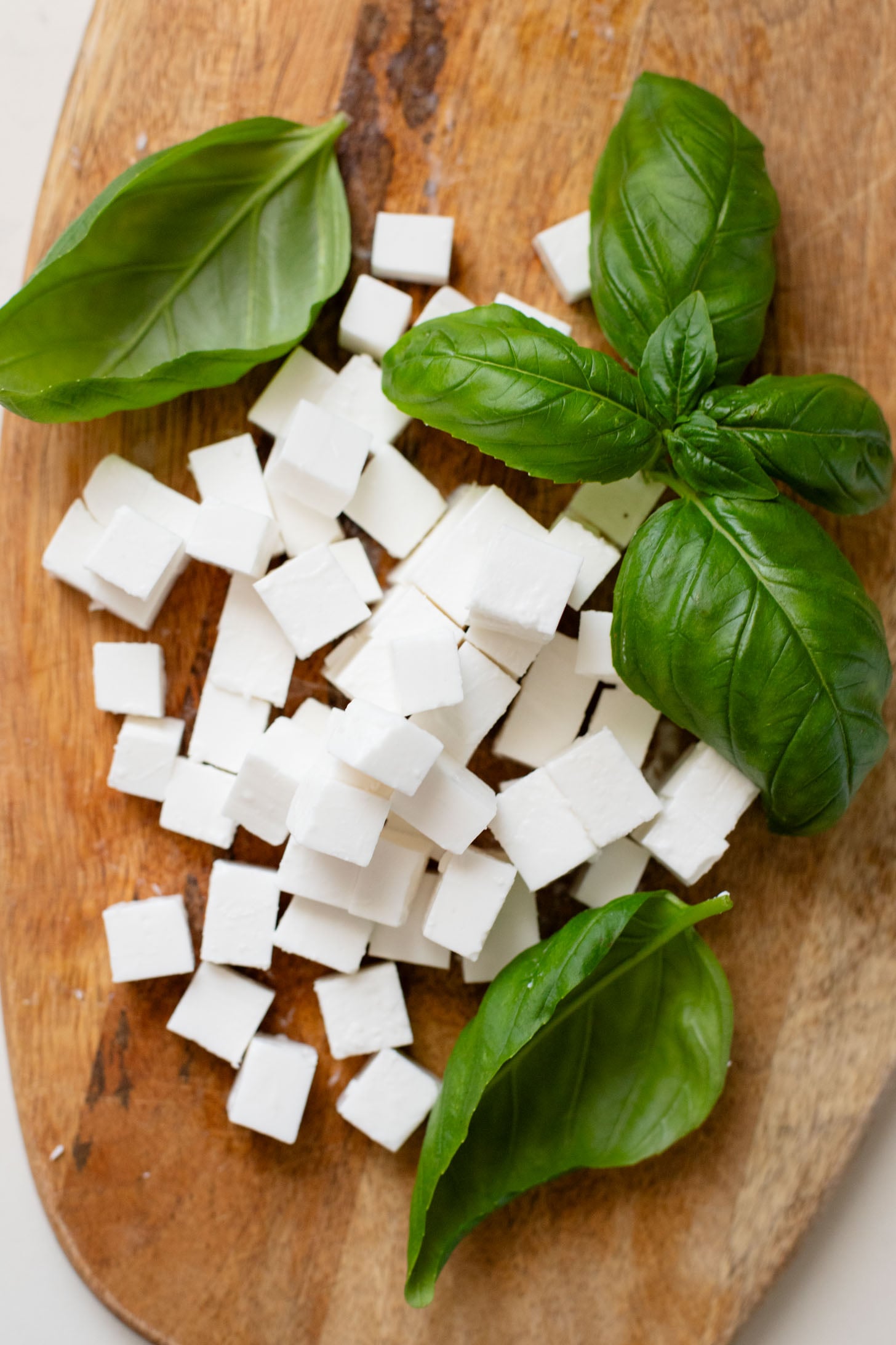 This White Bean Balsamic Pasta Salad is a summer must make! Made with vegan feta, cherry tomatoes, herbs, white beans & balsamic dressing | ThisSavoryVegan.com