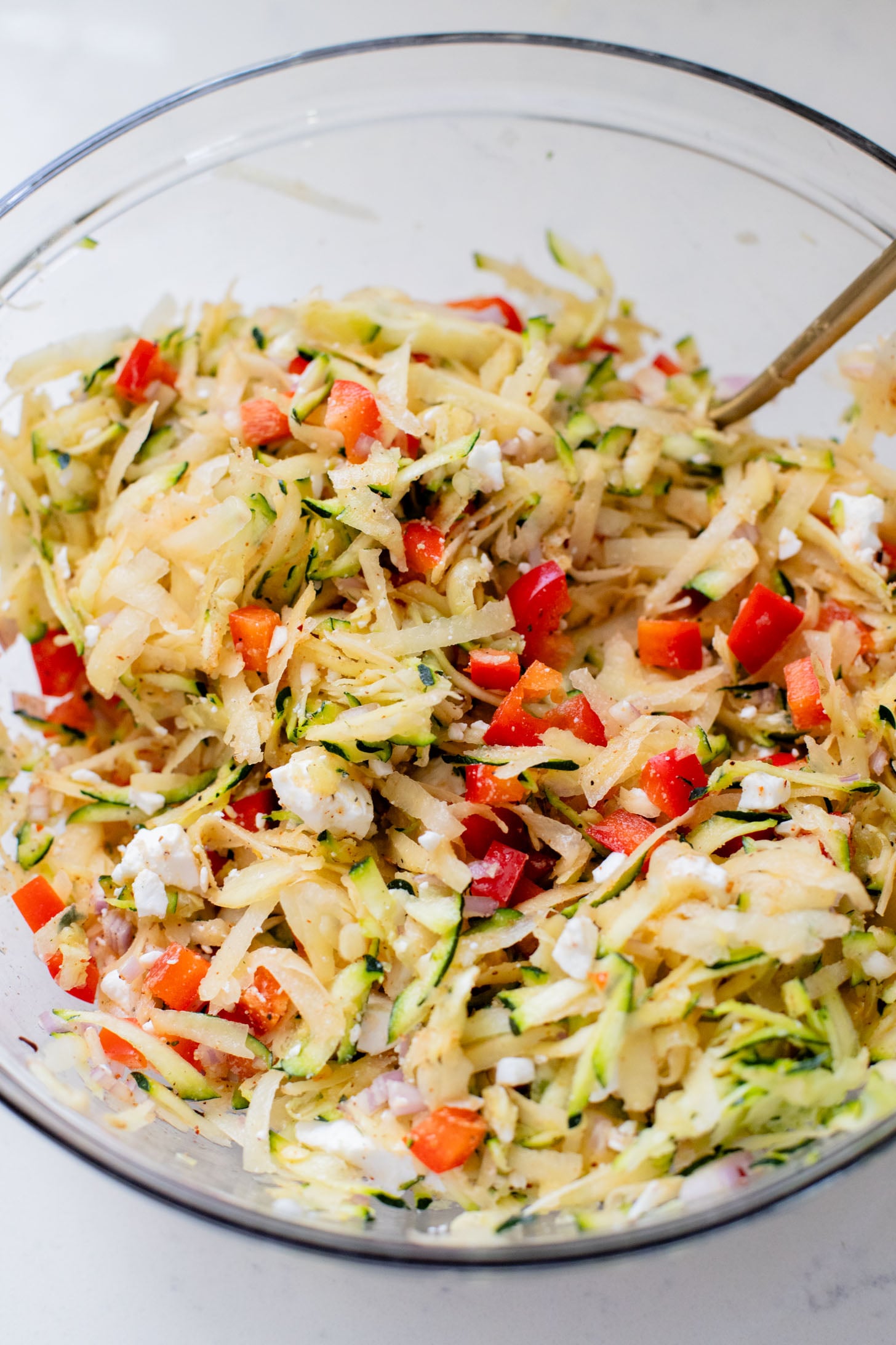 This Zucchini & Potato Vegan Egg Bake is the perfect summer brunch idea! Shredded zucchini & potatoes are baked with Just Egg | ThisSavoryVegan.com