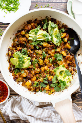 This Breakfast Potato Hash has simple ingredients, is dairy-free and is the perfect side dish for your next vegan brunch | ThisSavoryVegan.com