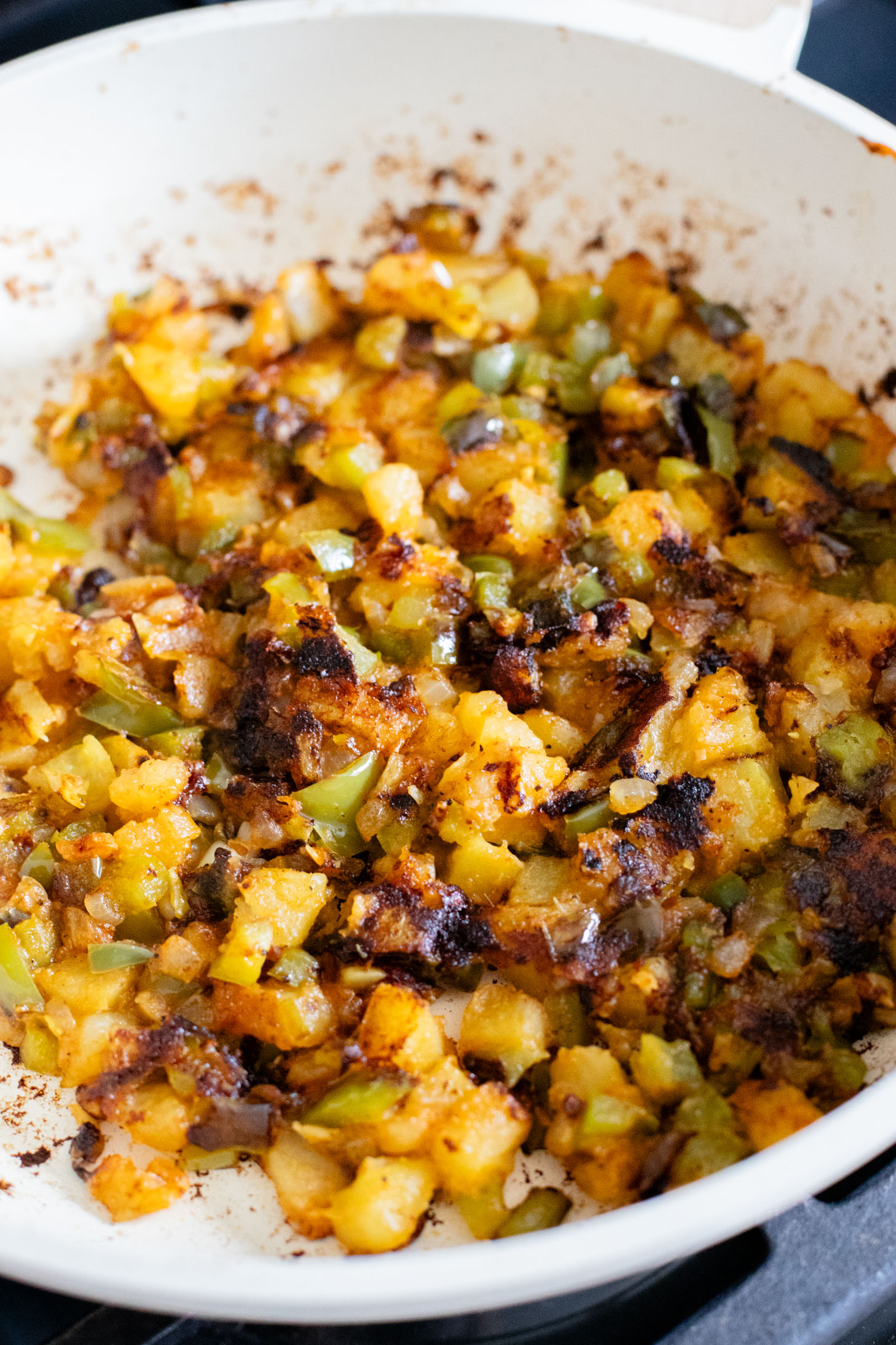 This Breakfast Potato Hash has simple ingredients, is dairy-free and is the perfect side dish for your next vegan brunch | ThisSavoryVegan.com