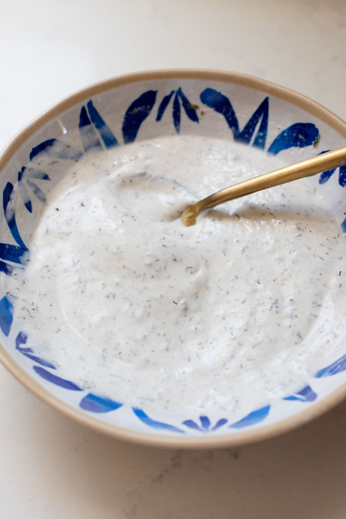 These Buffalo Oyster Mushroom Bowls are an easy vegan weeknight dinner! Layered with brown rice, black beans, crispy mushrooms & vegan ranch | ThisSavoryVegan.com
