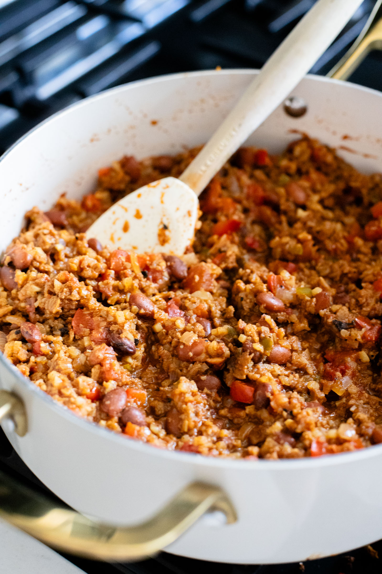 If you are in need of a low carb vegan dinner idea then you need to try this Cauliflower Rice Taco Skillet! Filled with veggies, beans & TONS of flavor | ThisSavoryVegan.com