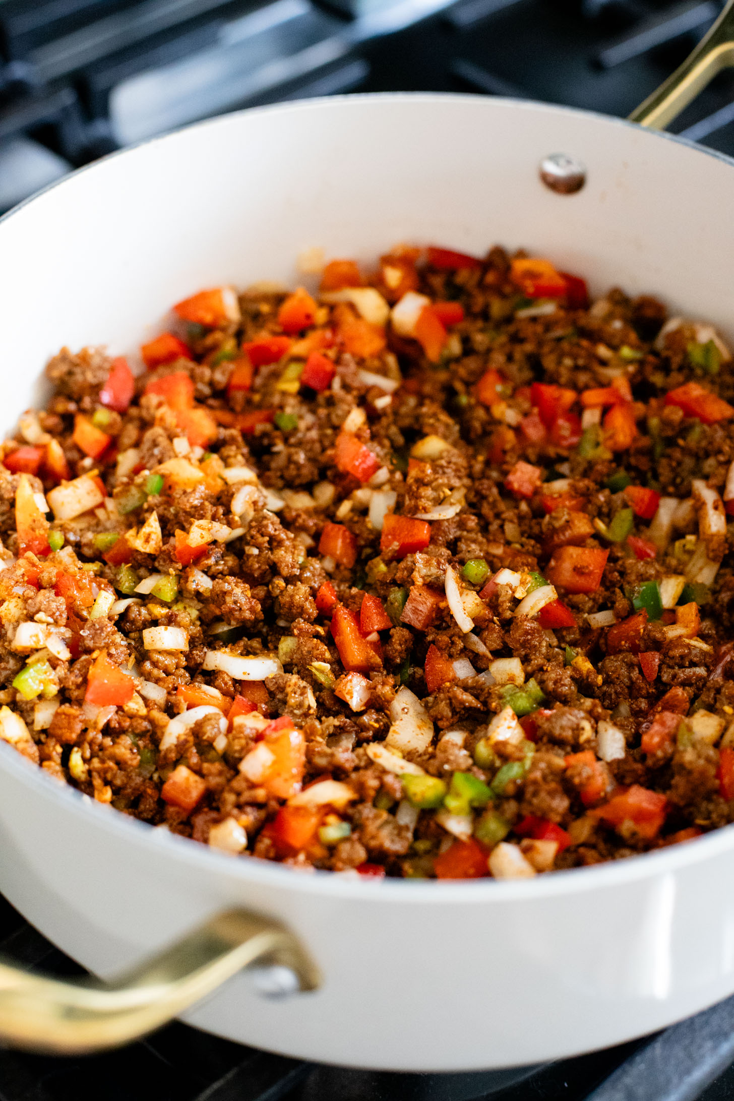 If you are in need of a low carb vegan dinner idea then you need to try this Cauliflower Rice Taco Skillet! Filled with veggies, beans & TONS of flavor | ThisSavoryVegan.com