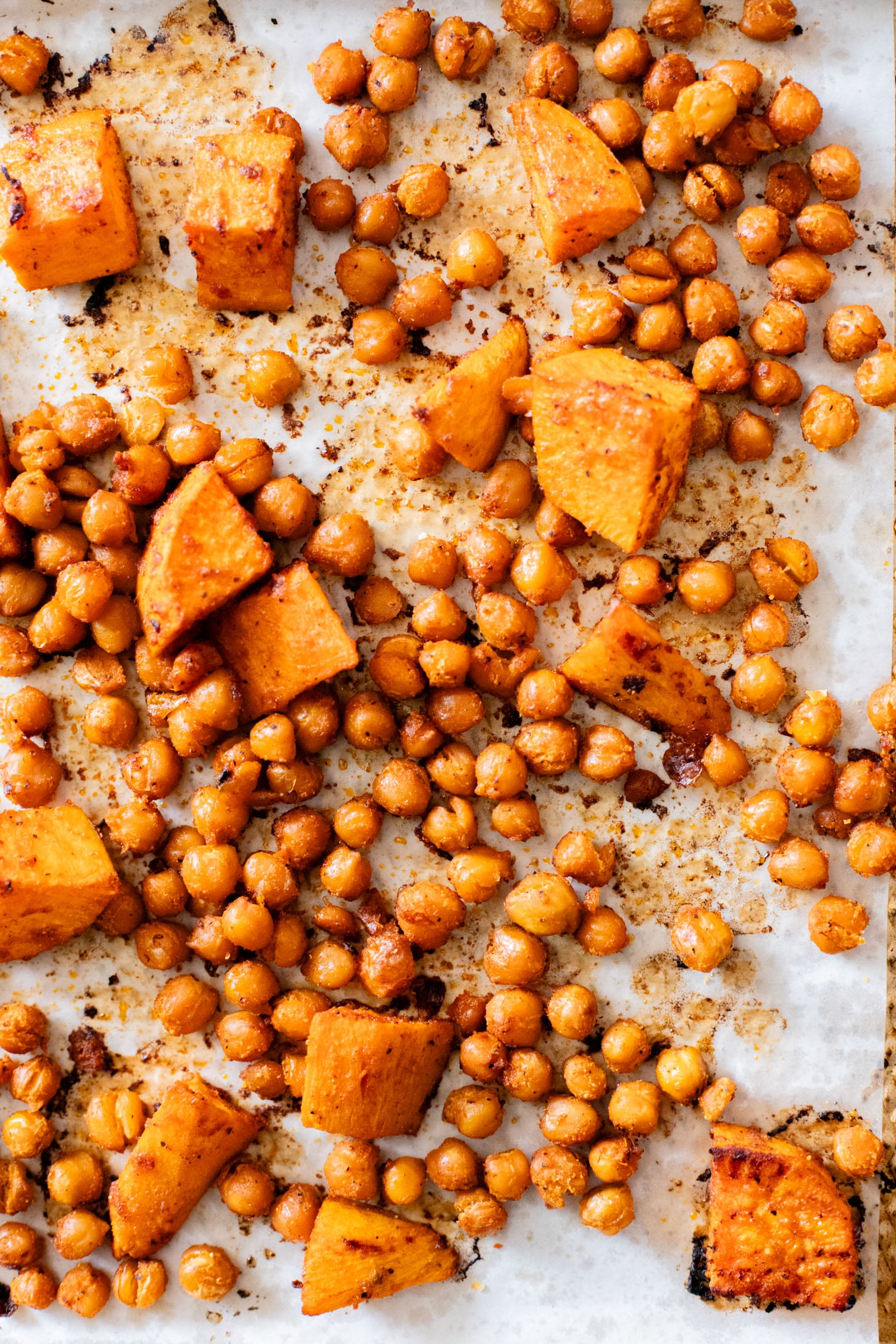 This Roasted Sweet Potato Salad is the perfect quick lunch or dinner! Served with quinoa, greens, avocado & tahini dressing | ThisSavoryVegan.com