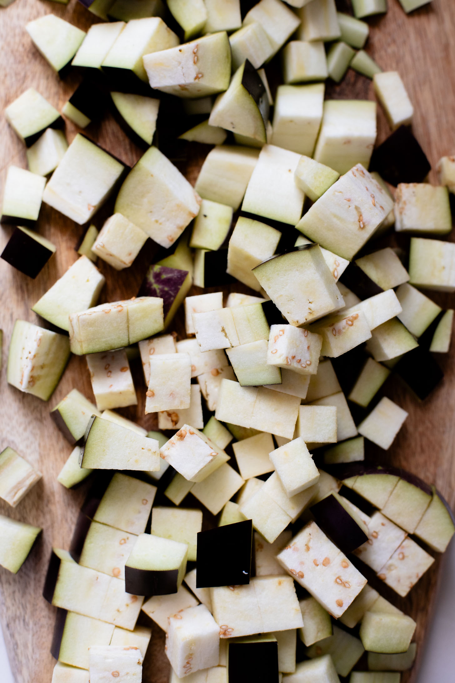 This Simple Eggplant Curry is made in one pot with a yellow curry coconut sauce, chickpeas, charred eggplant and veggies | ThisSavoryVegan.com