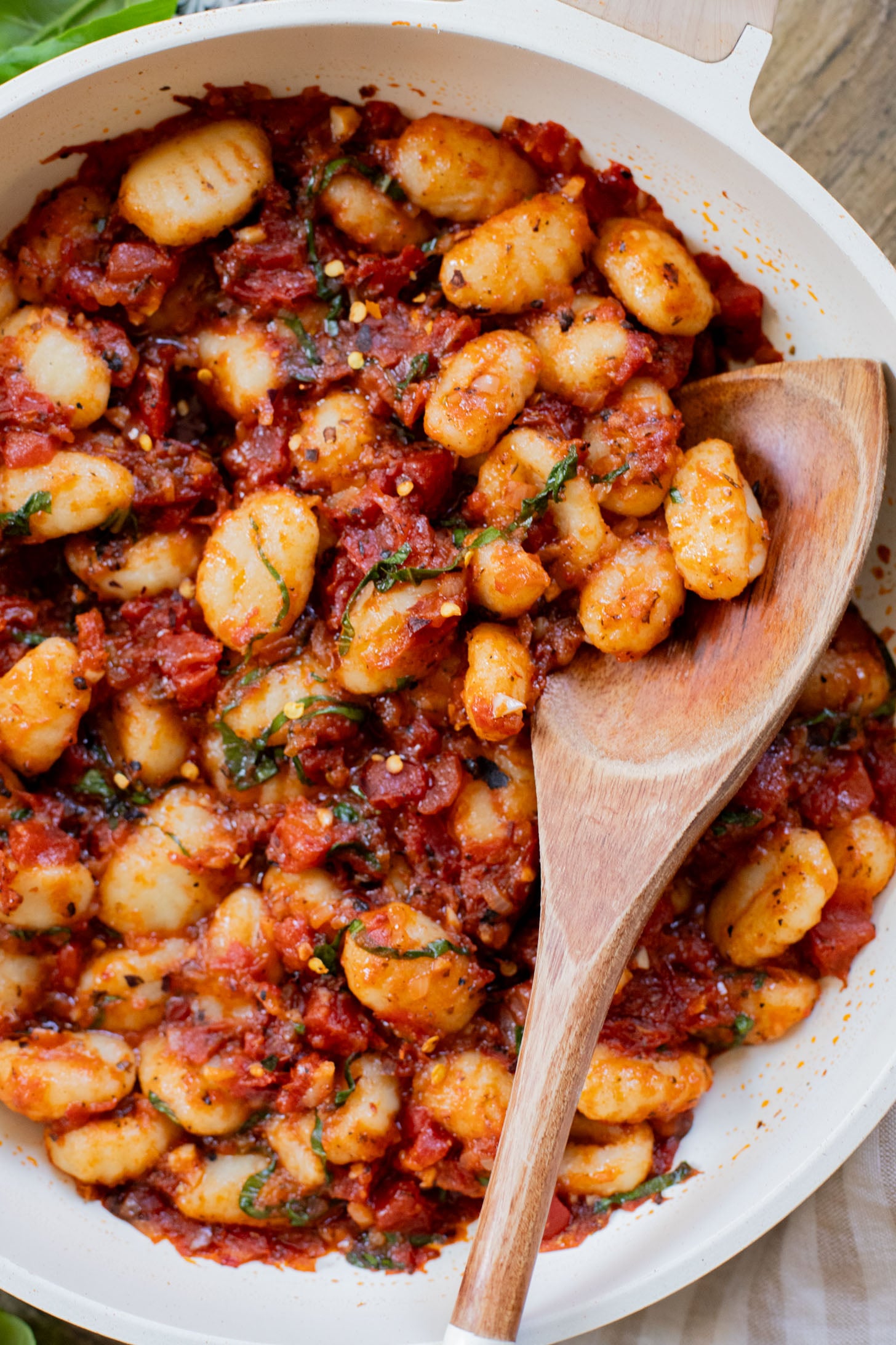 This Simple Tomato Basil Gnocchi is a rustic, 30-minute vegan dinner recipe that everyone will enjoy. Simple, delicious & easy | ThisSavoryVegan.com