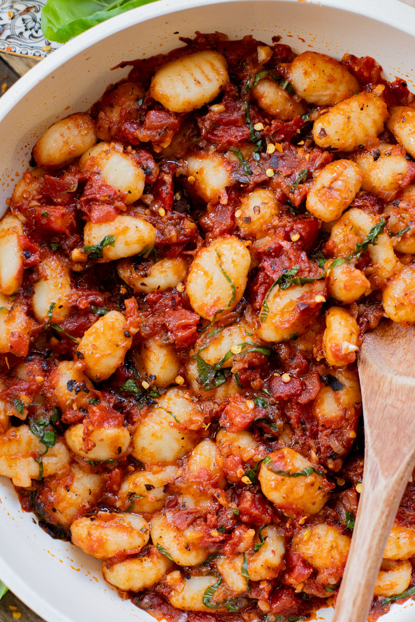 This Simple Tomato Basil Gnocchi is a rustic, 30-minute vegan dinner recipe that everyone will enjoy. Simple, delicious & easy | ThisSavoryVegan.com