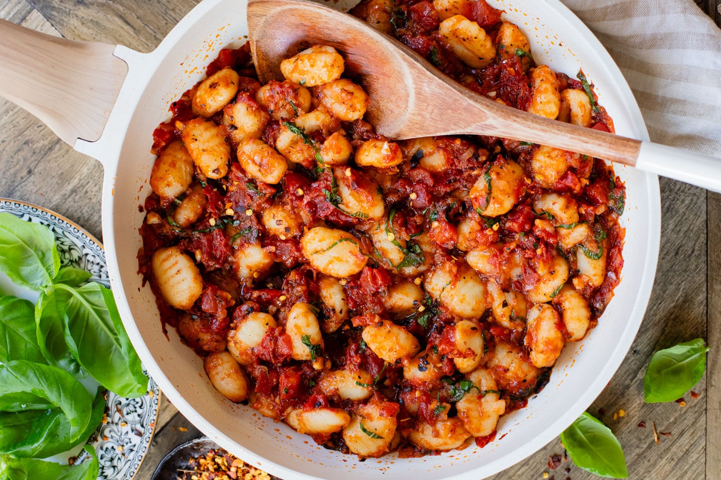 This Simple Tomato Basil Gnocchi is a rustic, 30-minute vegan dinner recipe that everyone will enjoy. Simple, delicious & easy | ThisSavoryVegan.com