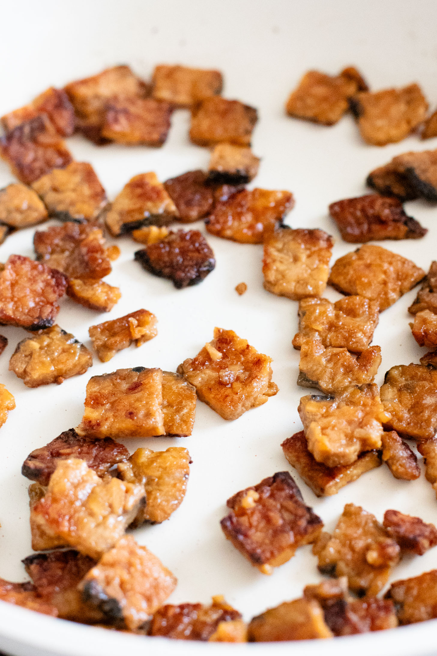 Healthy & delicious, this Tempeh Bacon Kale Salad is a vegan dream! Made with crispy tempeh bacon, chickpeas, avocado & lemon tahini dressing | ThisSavoryVegan.com