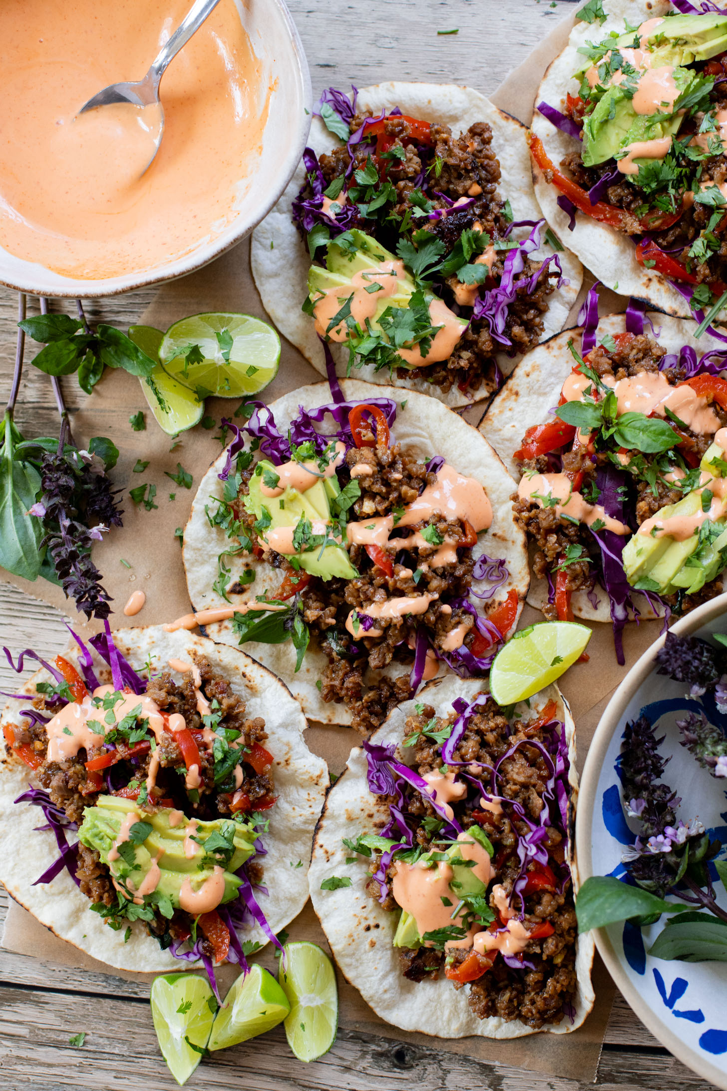 These Vegan Thai Beef Tacos are an explosion of flavor - filled with soy "beef" crumbles in a Thai-inspired sauce, spicy mayo, avocado & cabbage | ThisSavoryVegan.com