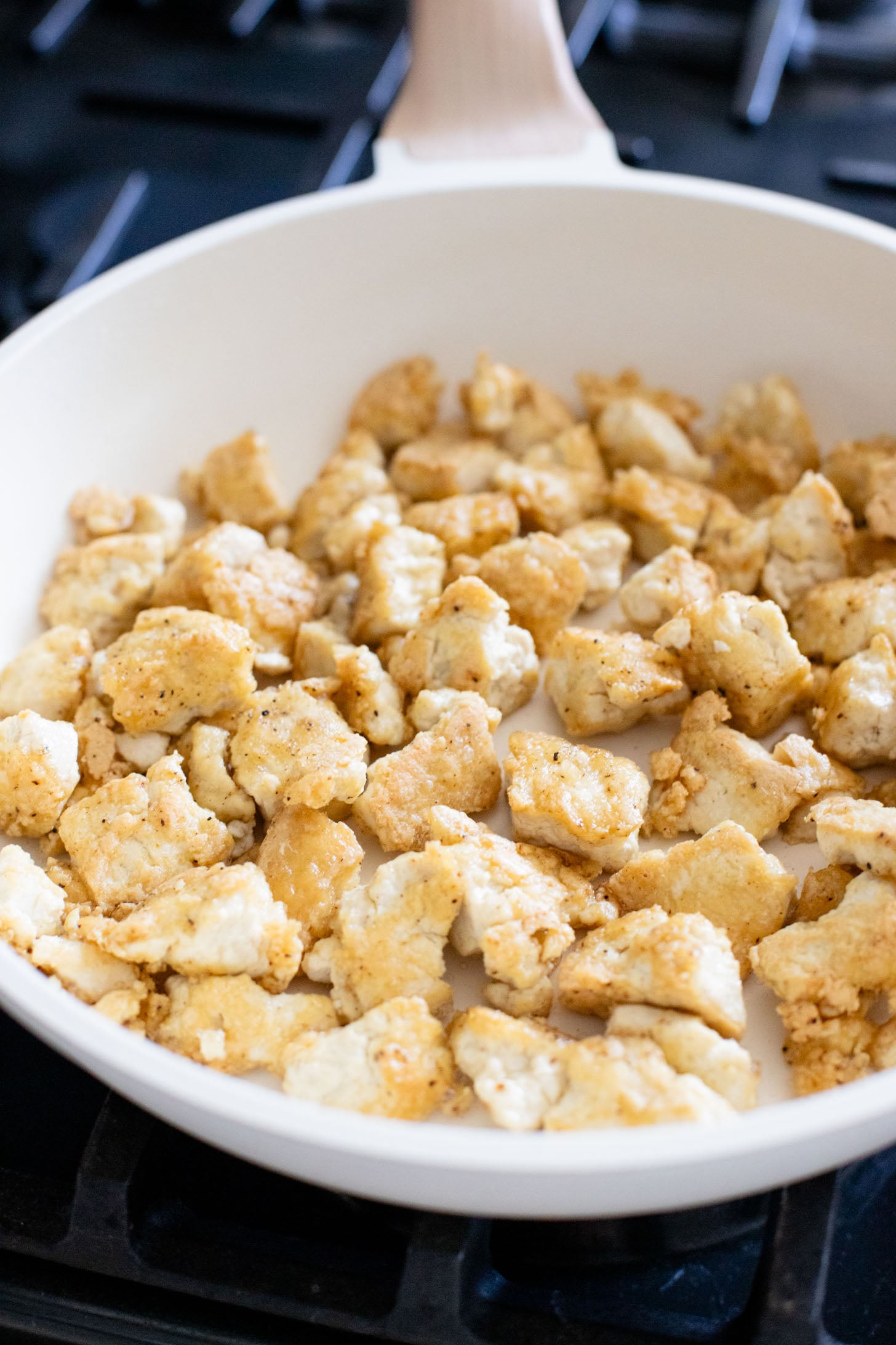 This Zucchini & Tofu Stir Fry is the perfect summer one-pot vegan dinner! Made with simple ingredients in a pre-made Soyaki sauce | ThisSavoryVegan.com
