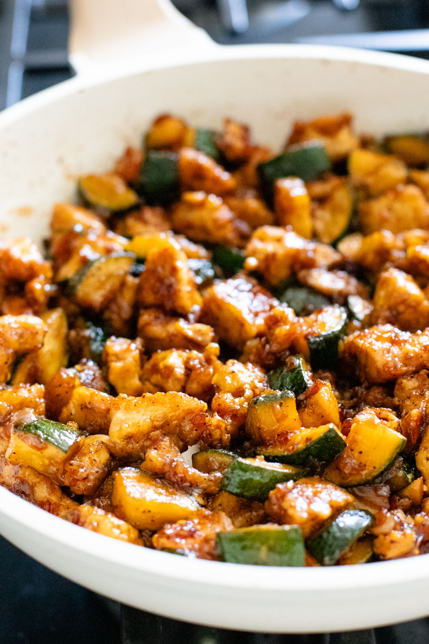 This Zucchini & Tofu Stir Fry is the perfect summer one-pot vegan dinner! Made with simple ingredients in a pre-made Soyaki sauce | ThisSavoryVegan.com