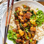 This Zucchini & Tofu Stir Fry is the perfect summer one-pot vegan dinner! Made with simple ingredients in a pre-made Soyaki sauce | ThisSavoryVegan.com