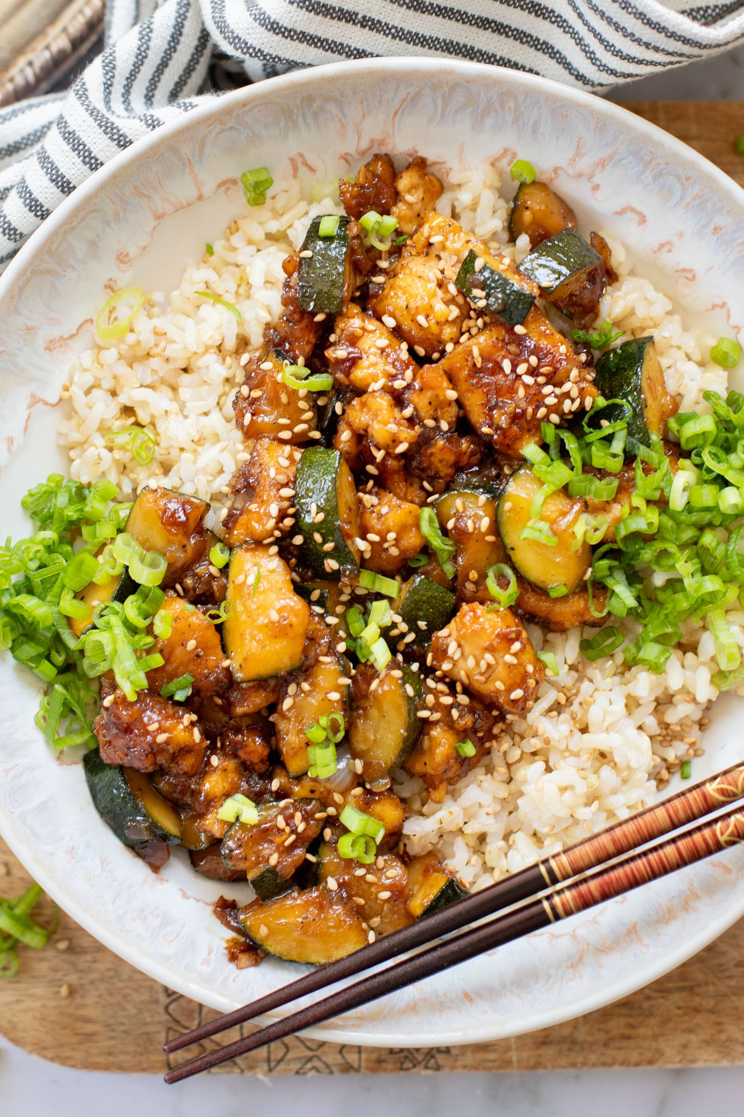 This Zucchini & Tofu Stir Fry is the perfect summer one-pot vegan dinner! Made with simple ingredients in a pre-made Soyaki sauce | ThisSavoryVegan.com
