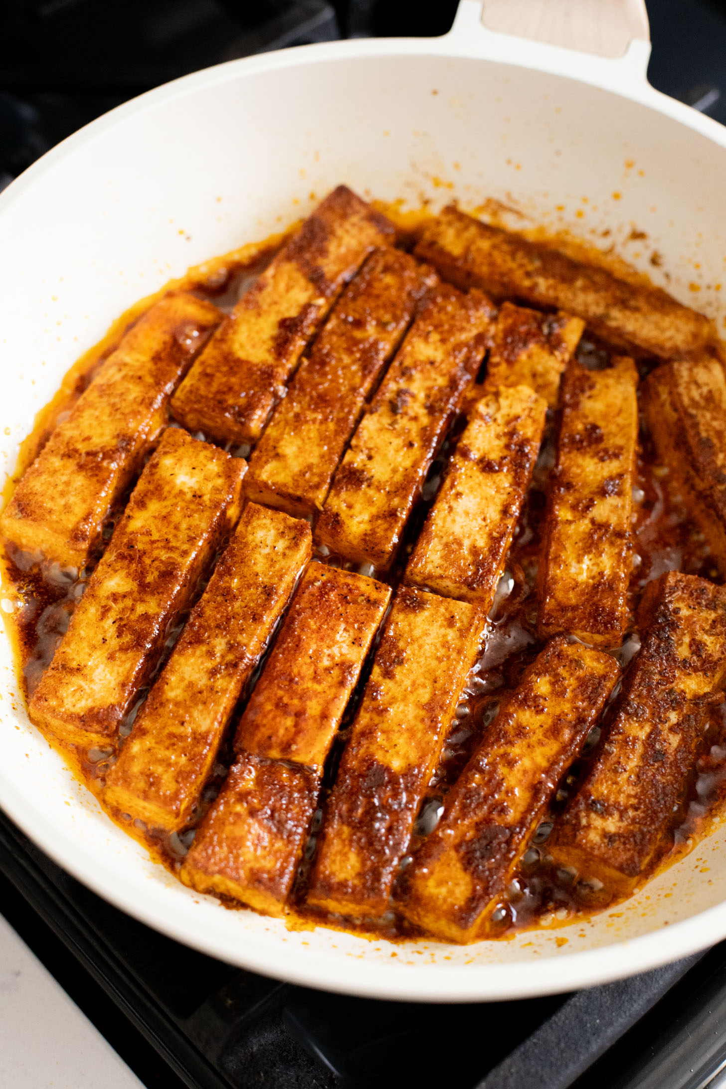 These Blackened Tofu Tacos are layered with crispy tofu, shredded cabbage, avocado and a creamy vegan sauce | ThisSavoryVegan.com