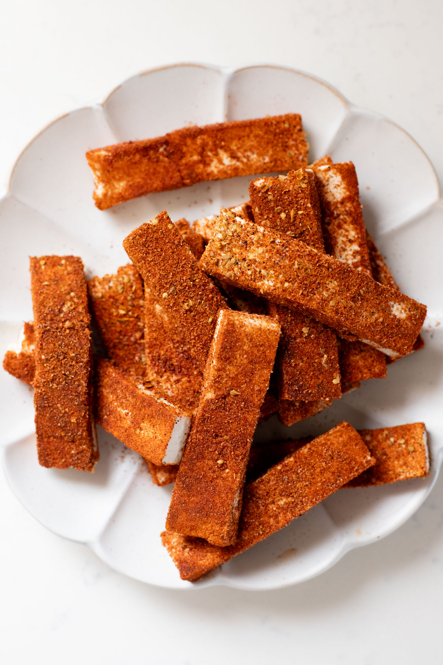 These Blackened Tofu Tacos are layered with crispy tofu, shredded cabbage, avocado and a creamy vegan sauce | ThisSavoryVegan.com