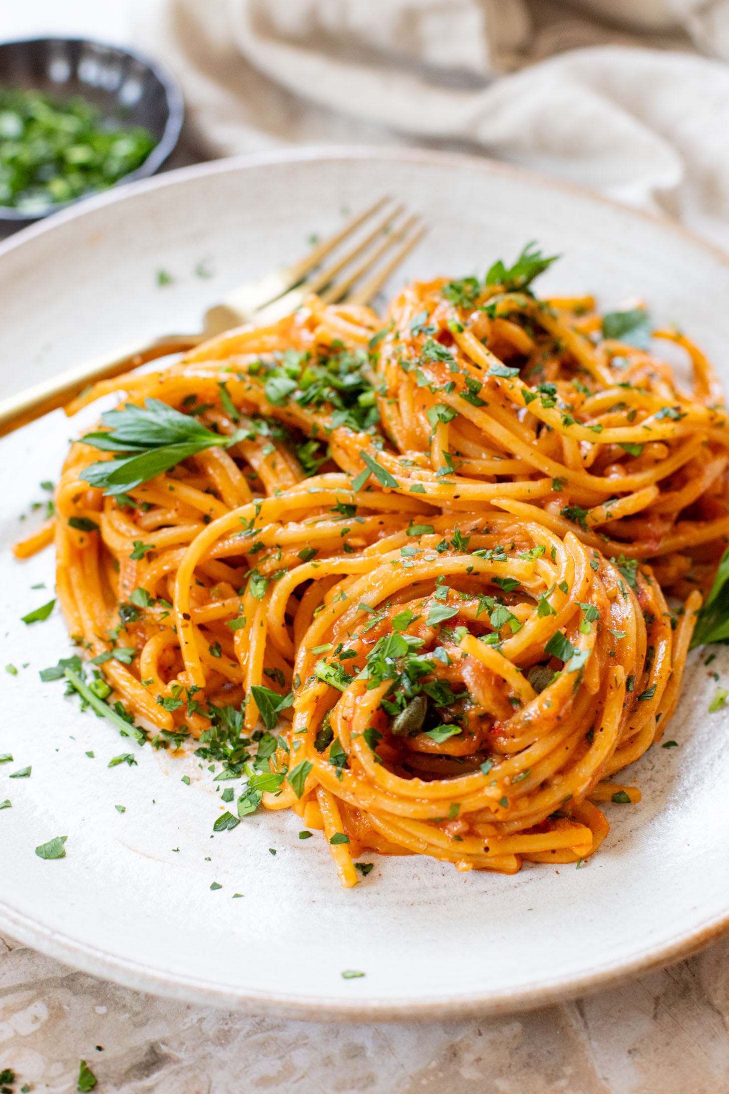 This Caramelized Shallot Pasta is creamy and delicious. Shallots are cooked down until soft and then transformed into a creamy vegan tomato sauce | ThisSavoryVegan.com