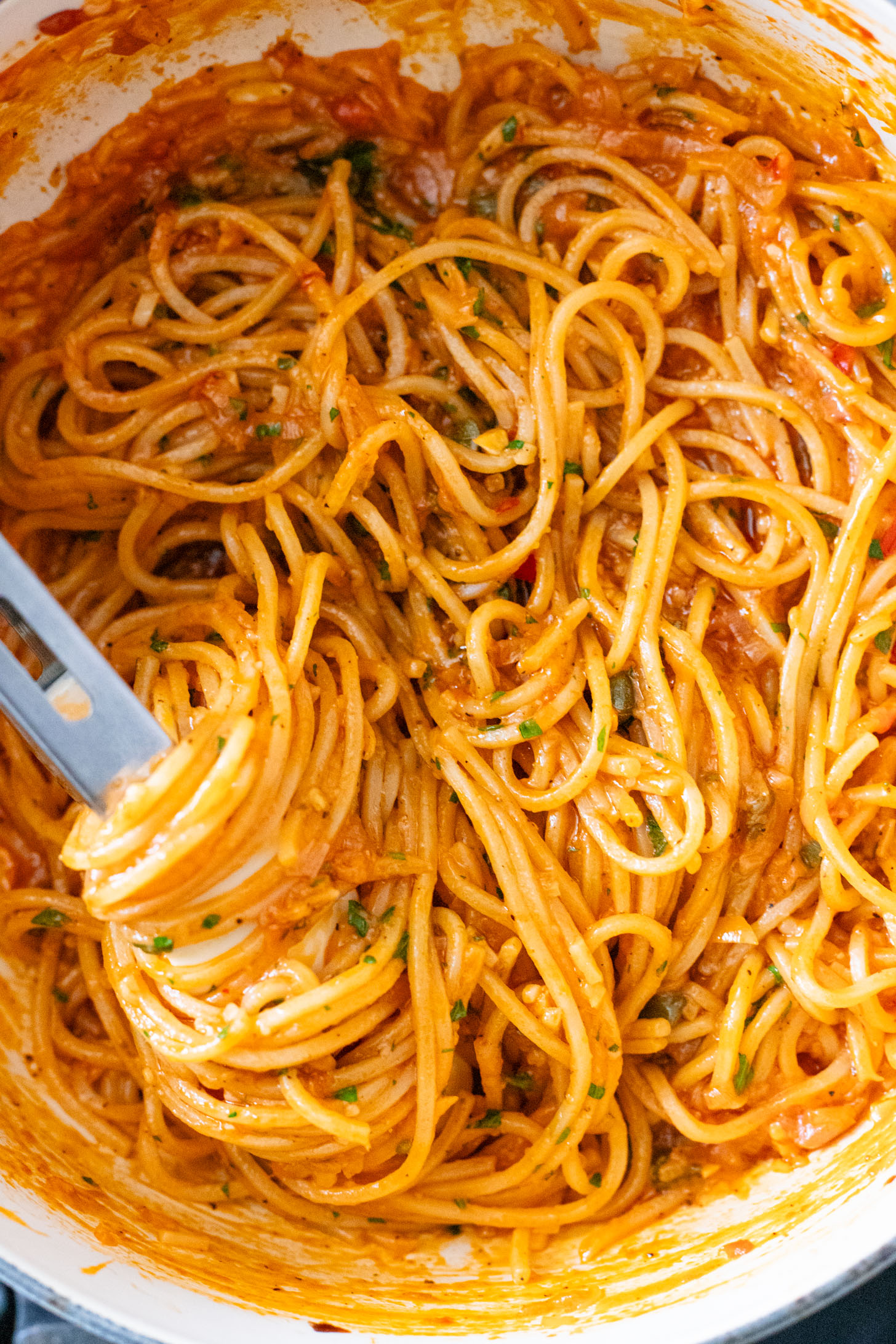 This Caramelized Shallot Pasta is creamy and delicious. Shallots are cooked down until soft and then transformed into a creamy vegan tomato sauce | ThisSavoryVegan.com