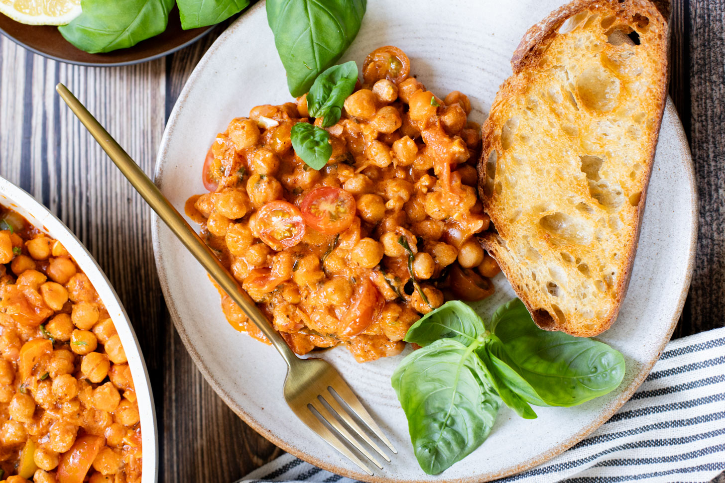 These Creamy Tomato Chickpeas make the perfect one-pot vegan dinner! Ready in just 30 minutes with simple ingredients | ThisSavoryVegan.com