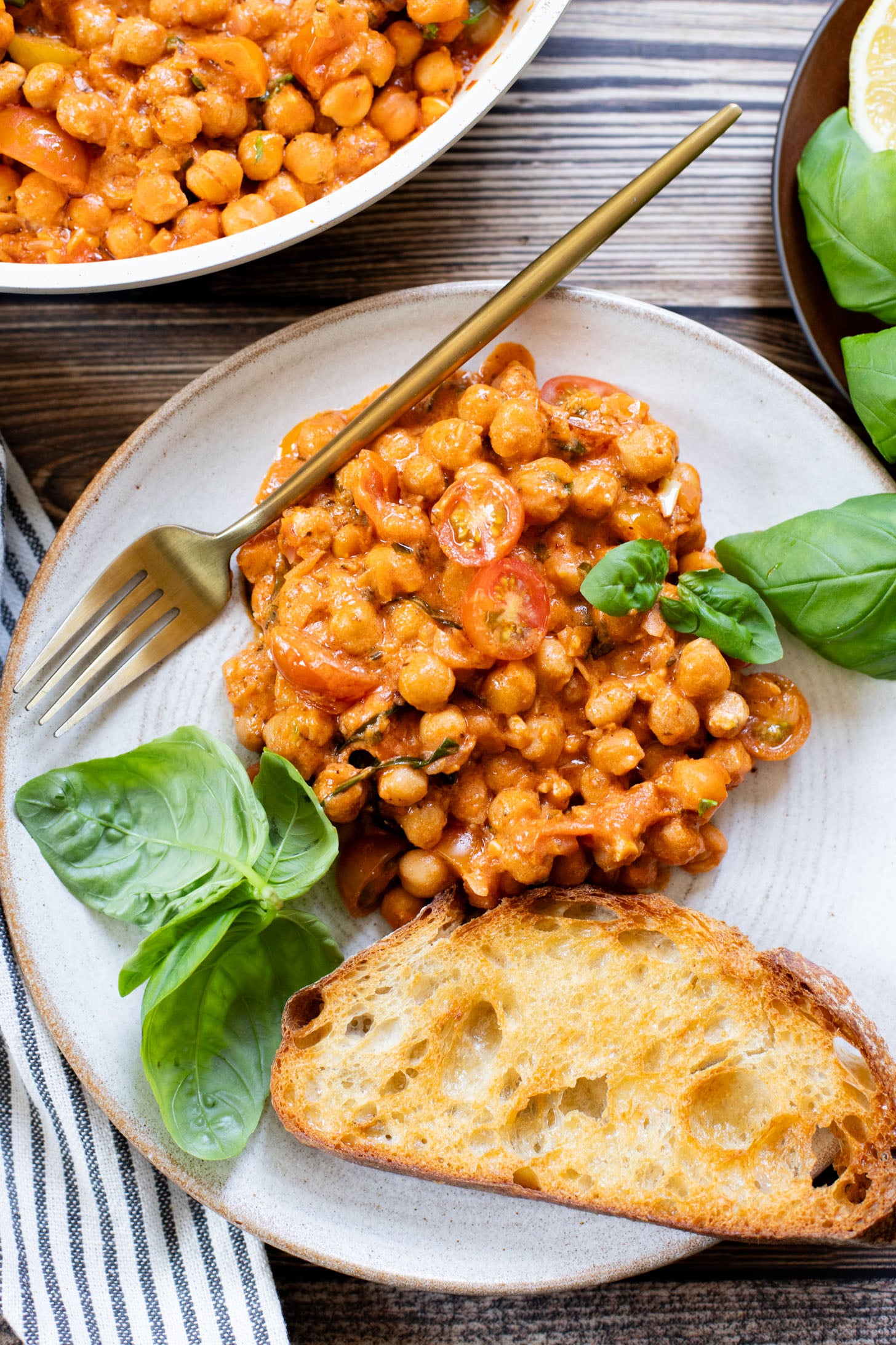 These Creamy Tomato Chickpeas make the perfect one-pot vegan dinner! Ready in just 30 minutes with simple ingredients | ThisSavoryVegan.com