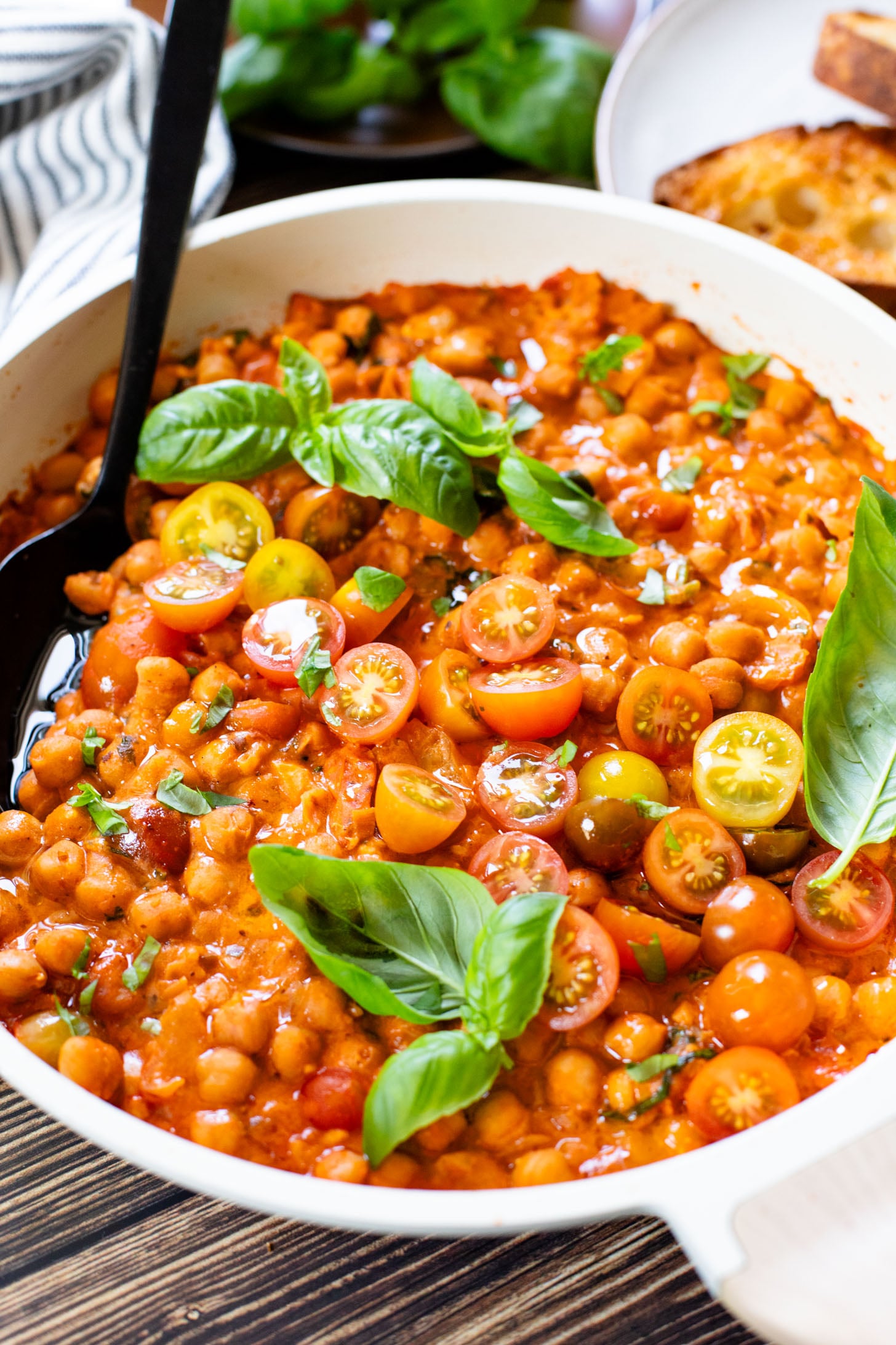 These Creamy Tomato Chickpeas make the perfect one-pot vegan dinner! Ready in just 30 minutes with simple ingredients | ThisSavoryVegan.com