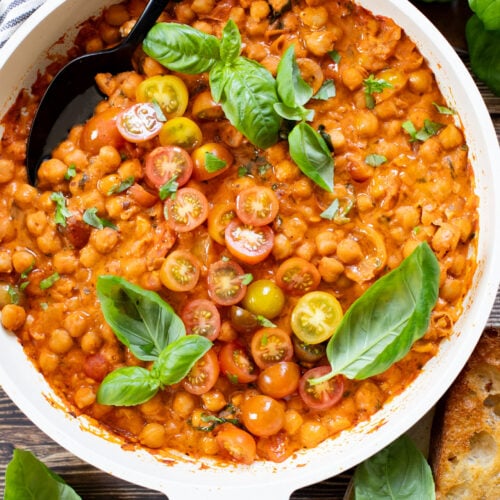 These Creamy Tomato Chickpeas make the perfect one-pot vegan dinner! Ready in just 30 minutes with simple ingredients | ThisSavoryVegan.com