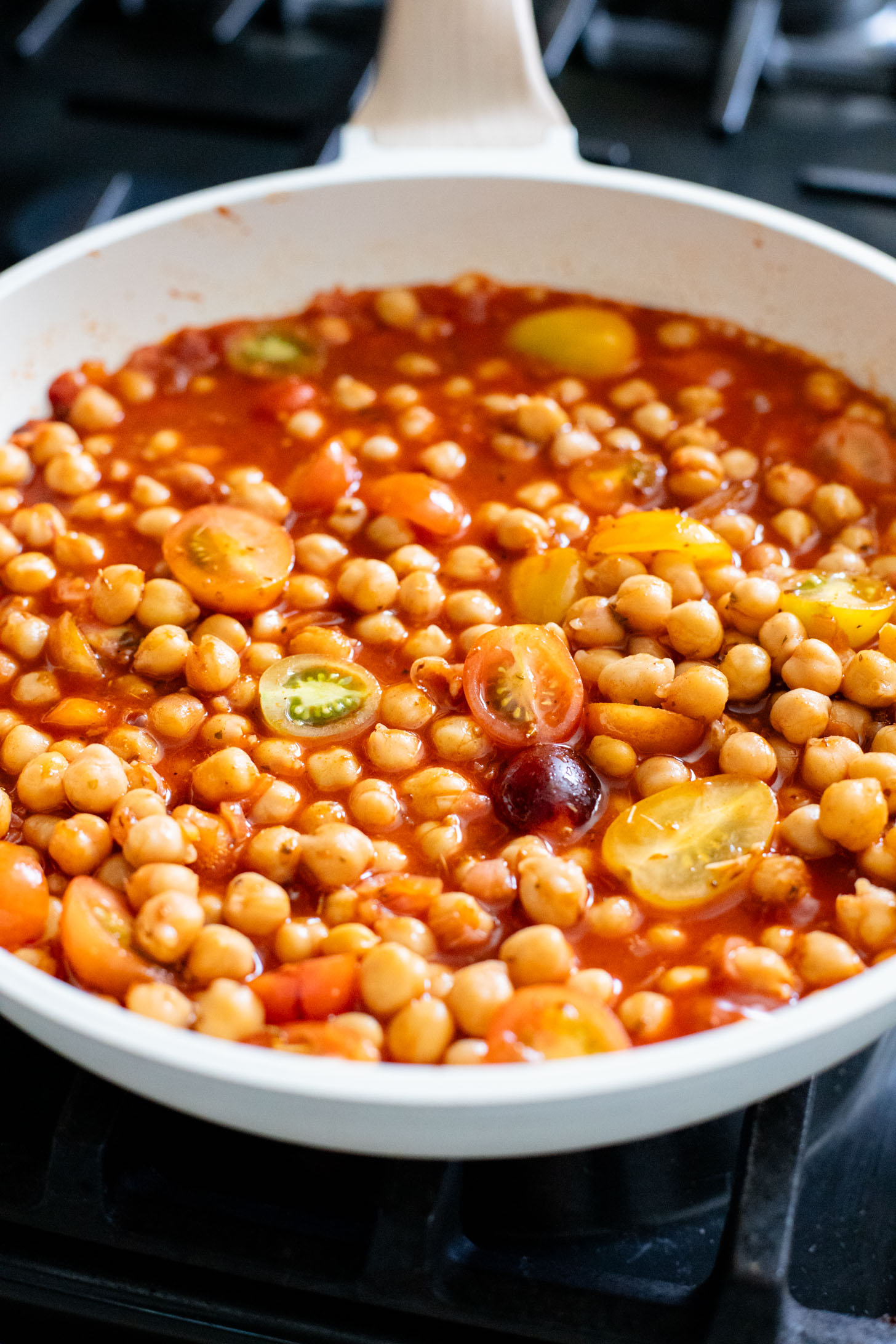These Creamy Tomato Chickpeas make the perfect one-pot vegan dinner! Ready in just 30 minutes with simple ingredients | ThisSavoryVegan.com