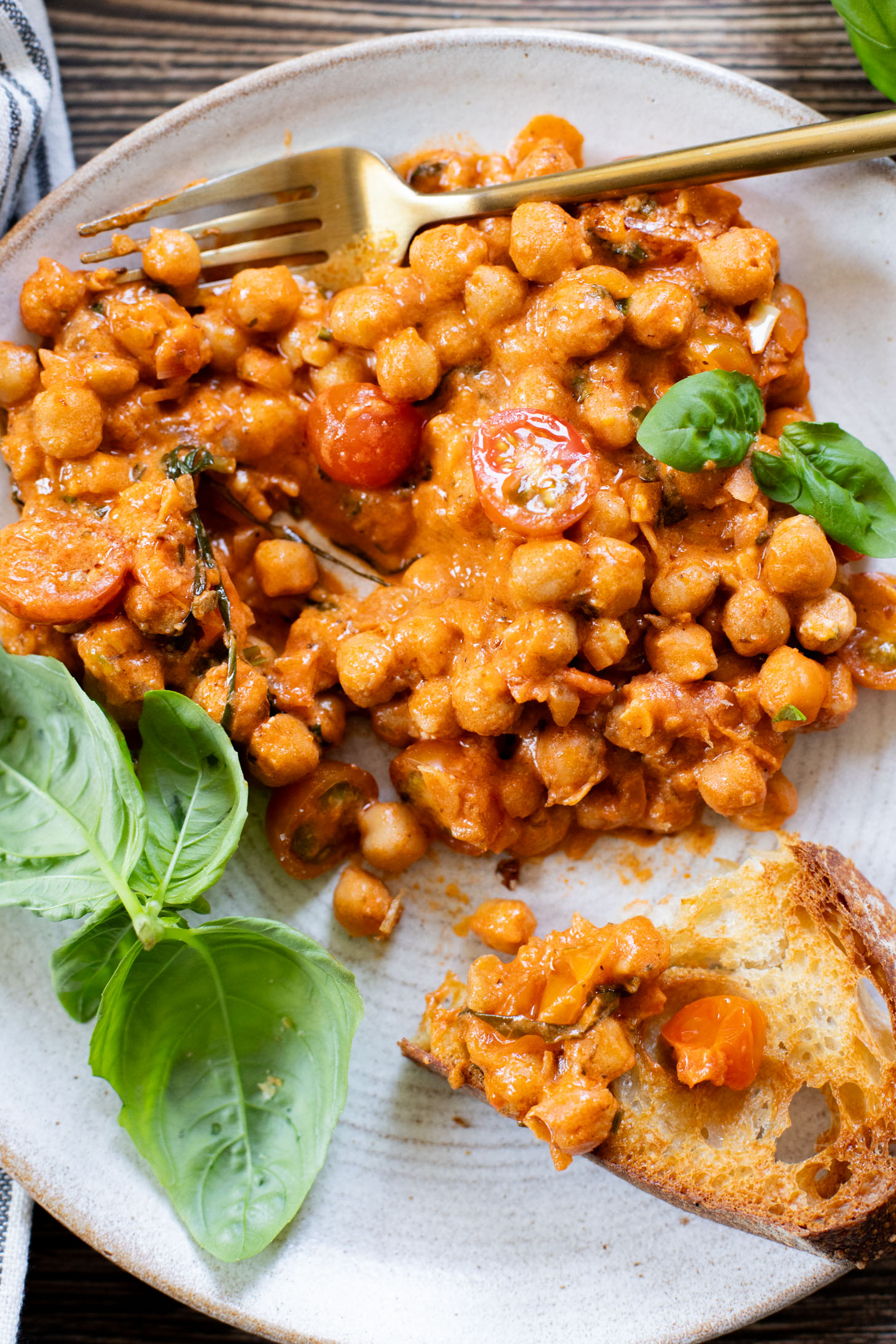 These Creamy Tomato Chickpeas make the perfect one-pot vegan dinner! Ready in just 30 minutes with simple ingredients | ThisSavoryVegan.com