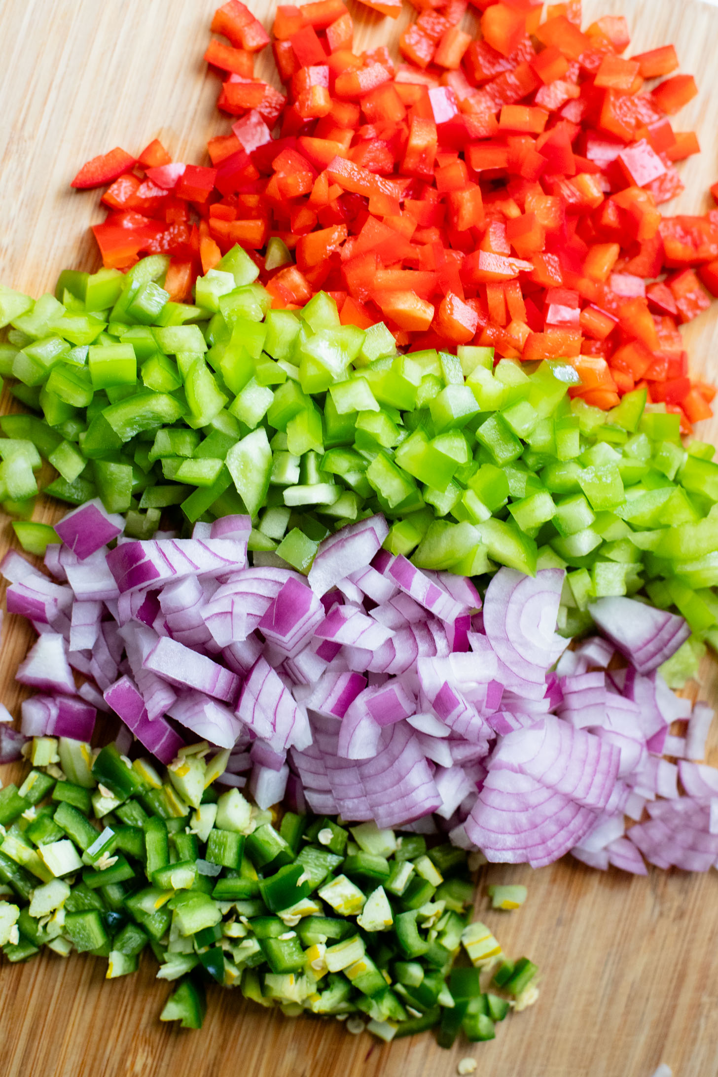 These Salsa Verde Black Bean Bowls are quick, easy & tasty. The bowls are filled with quinoa, seasoned beans & lots of veggies | ThisSavoryVegan.com