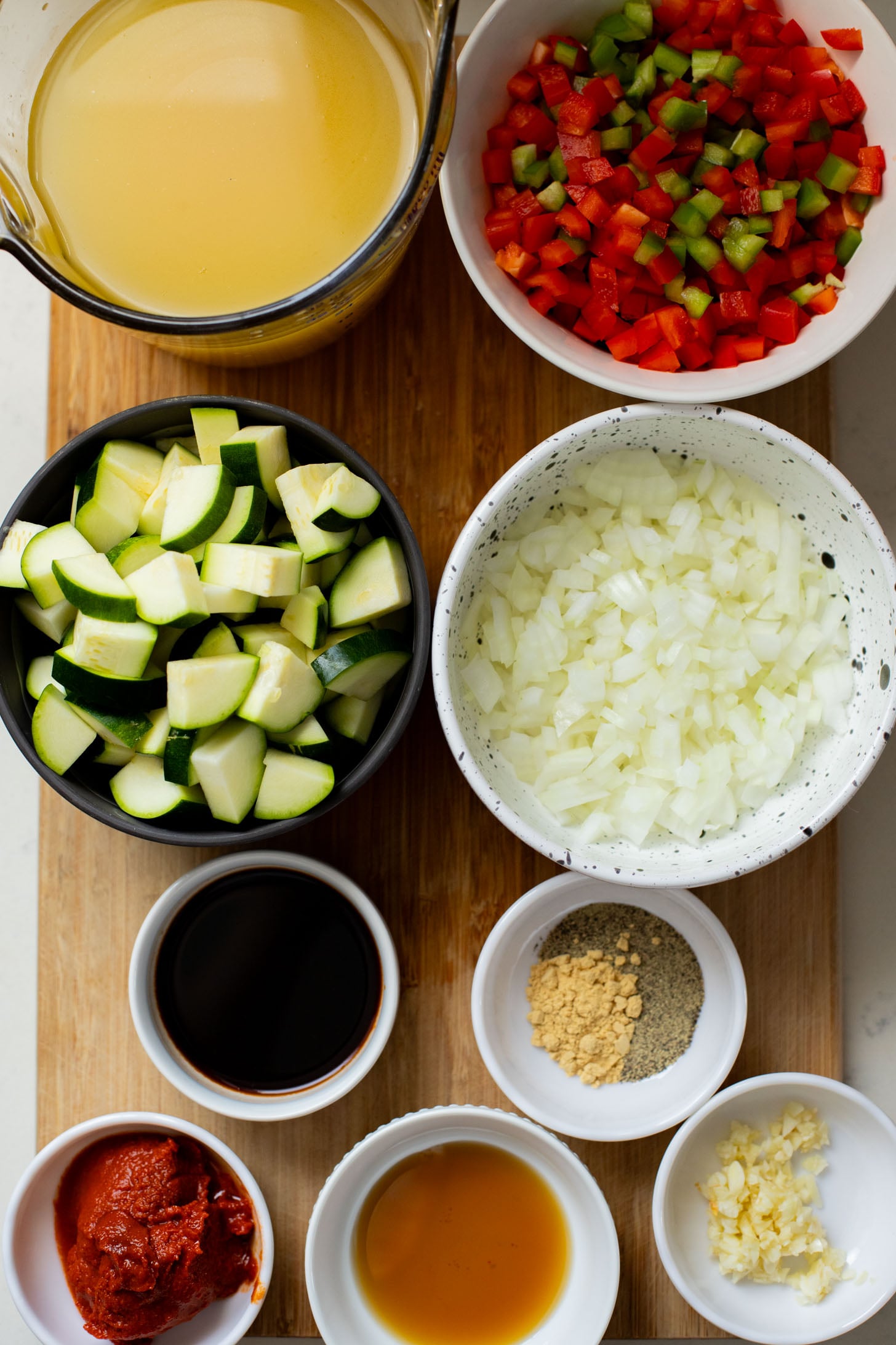 This Slow Cooker Veggie Curry Soup is a vegan dinner dream! Very little prep time, tons of veggies and zero cooking required | ThisSavoryVegan.com