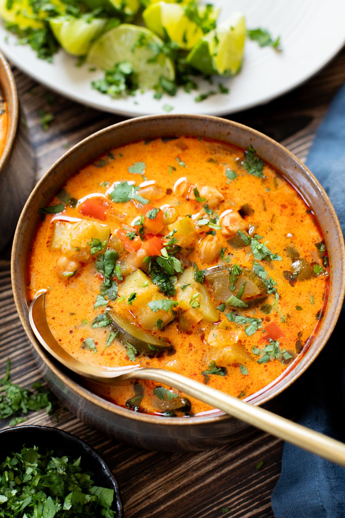 This Slow Cooker Veggie Curry Soup is a vegan dinner dream! Very little prep time, tons of veggies and zero cooking required | ThisSavoryVegan.com