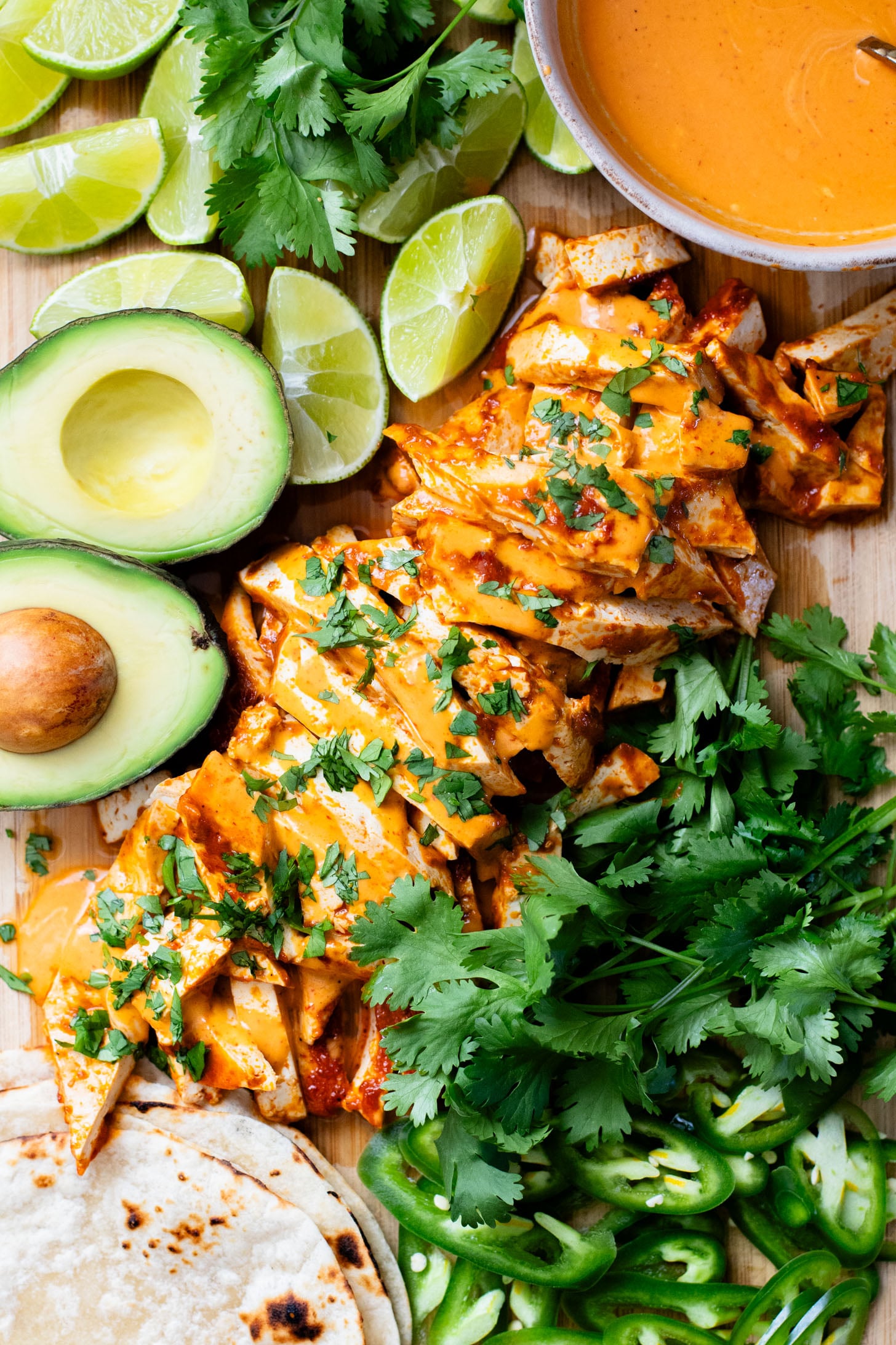 These Baked Chipotle Tofu Tacos are layered with marinated & baked tofu, cabbage, cilantro & a creamy dairy-free chipotle sauce | ThisSavoryVegan.com