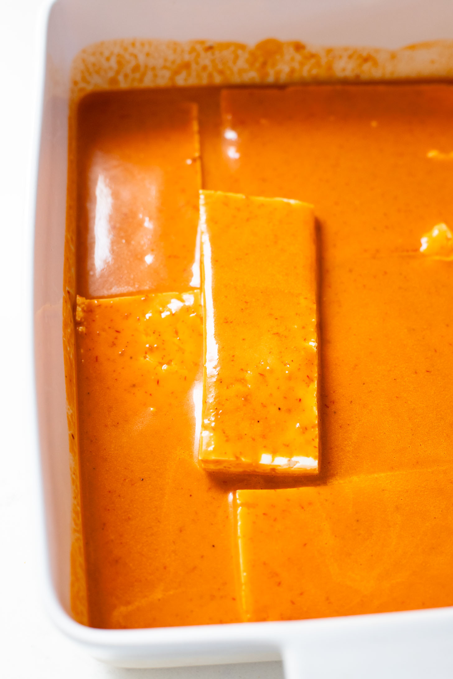 These Baked Chipotle Tofu Tacos are layered with marinated & baked tofu, cabbage, cilantro & a creamy dairy-free chipotle sauce | ThisSavoryVegan.com