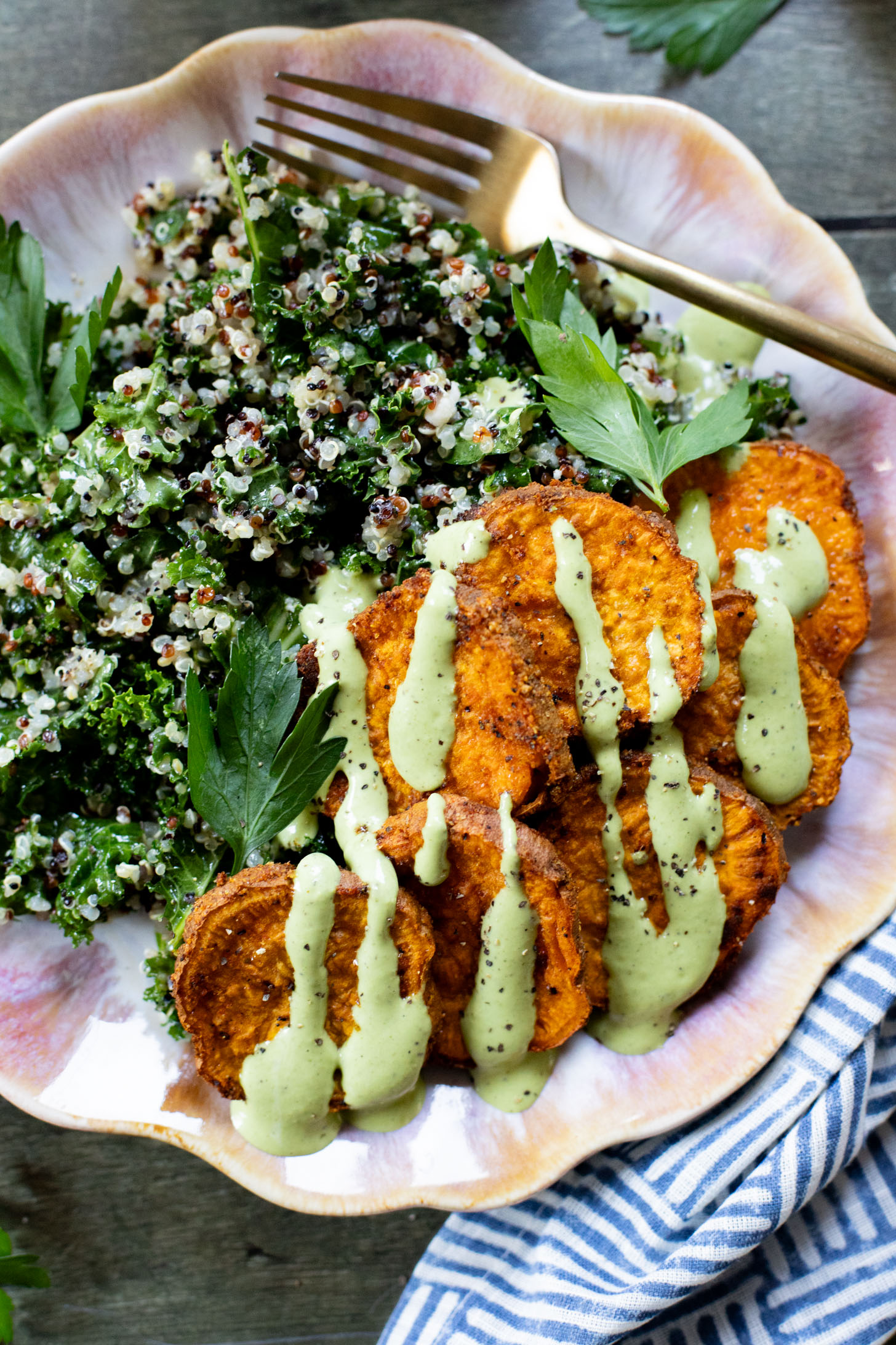 These Lemon Herb Sweet Potato Quinoa Bowls are healthy and tasty! Quinoa & kale salad is topped with roasted sweet potatoes & basil dressing | ThisSavoryVegan.com