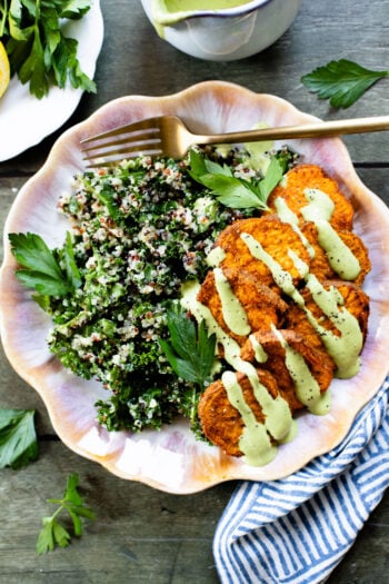 These Lemon Herb Sweet Potato Quinoa Bowls are healthy and tasty! Quinoa & kale salad is topped with roasted sweet potatoes & basil dressing | ThisSavoryVegan.com