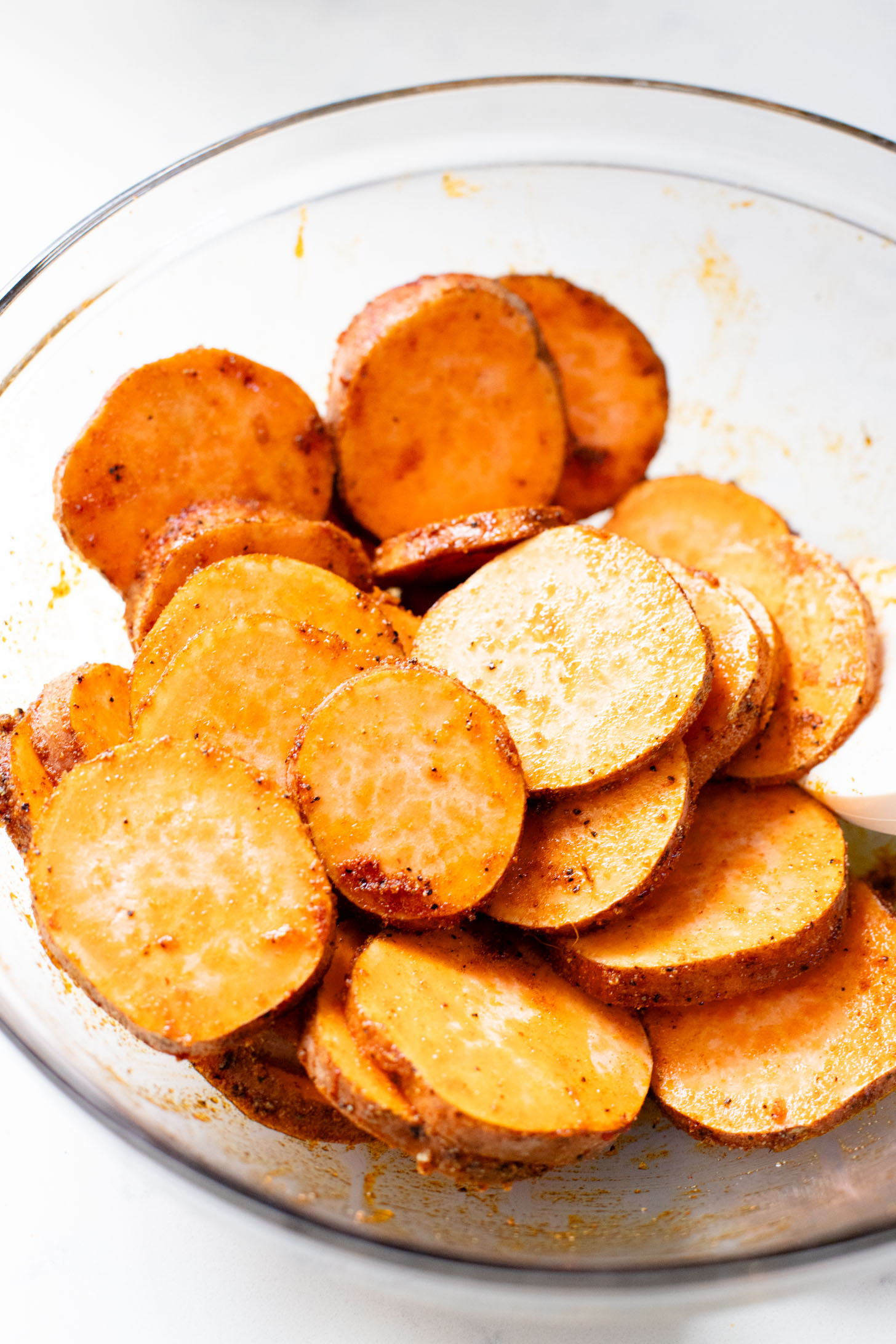 These Lemon Herb Sweet Potato Quinoa Bowls are healthy and tasty! Quinoa & kale salad is topped with roasted sweet potatoes & basil dressing | ThisSavoryVegan.com