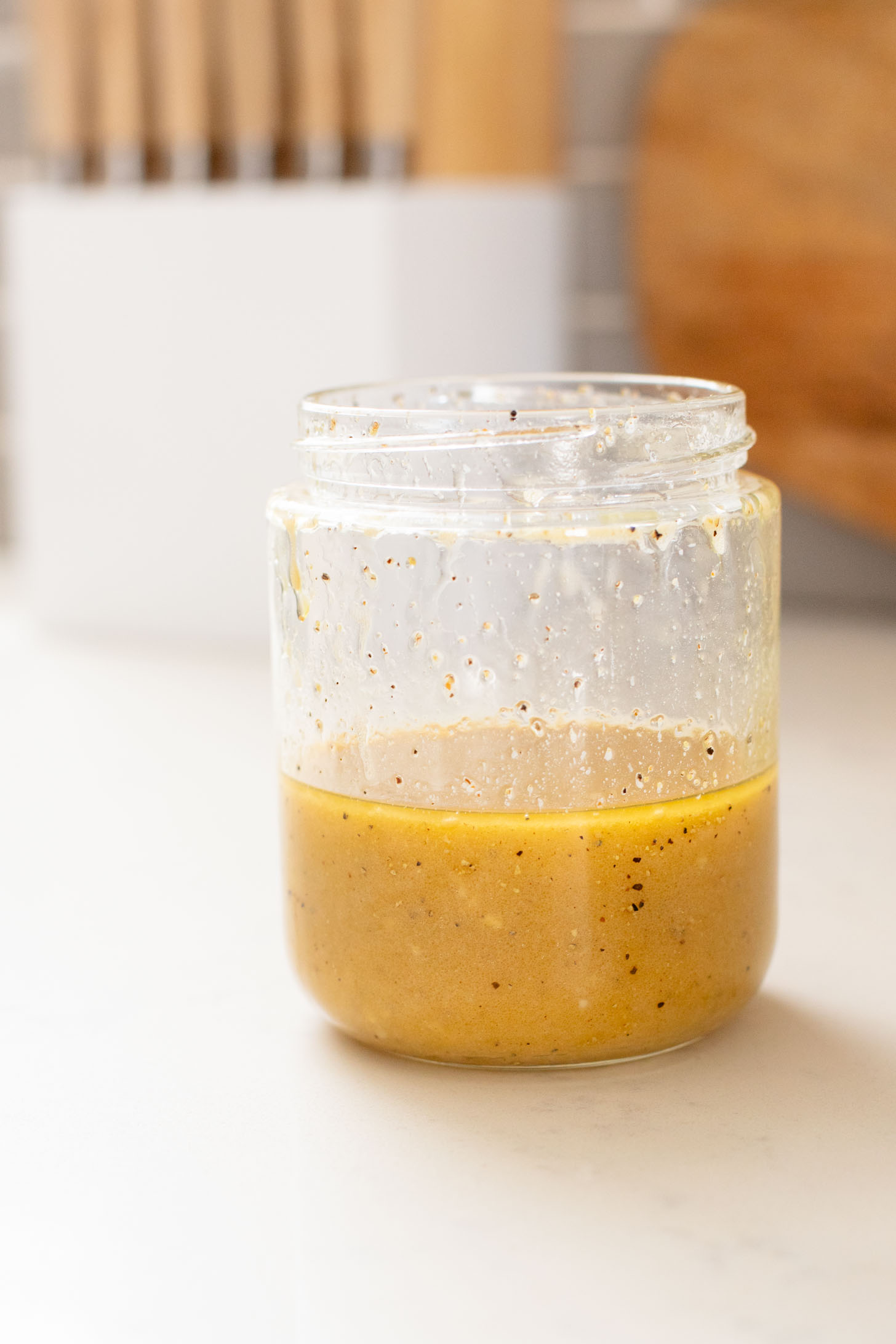 This Pizza Night Chopped Salad is the perfect side for, you guessed it, pizza night! Crunchy veggies, vegan pepperoni & a tangy dressing | ThisSavoryVegan.com