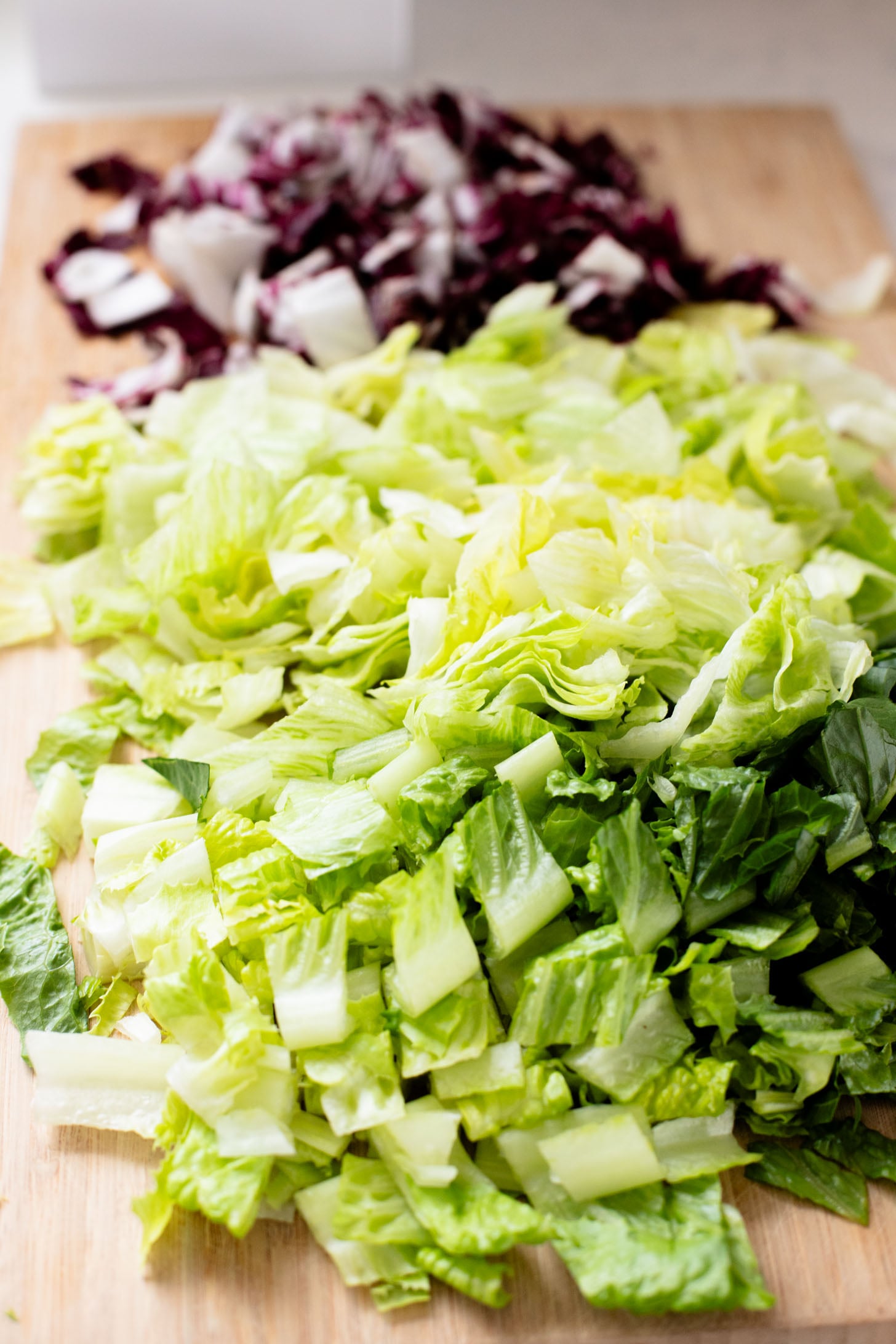 This Pizza Night Chopped Salad is the perfect side for, you guessed it, pizza night! Crunchy veggies, vegan pepperoni & a tangy dressing | ThisSavoryVegan.com