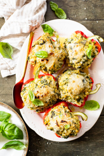 These Ricotta Couscous Stuffed Peppers are dairy-free, creamy deliciousness! A protein-packed vegan dinner idea | ThisSavoryVegan.com