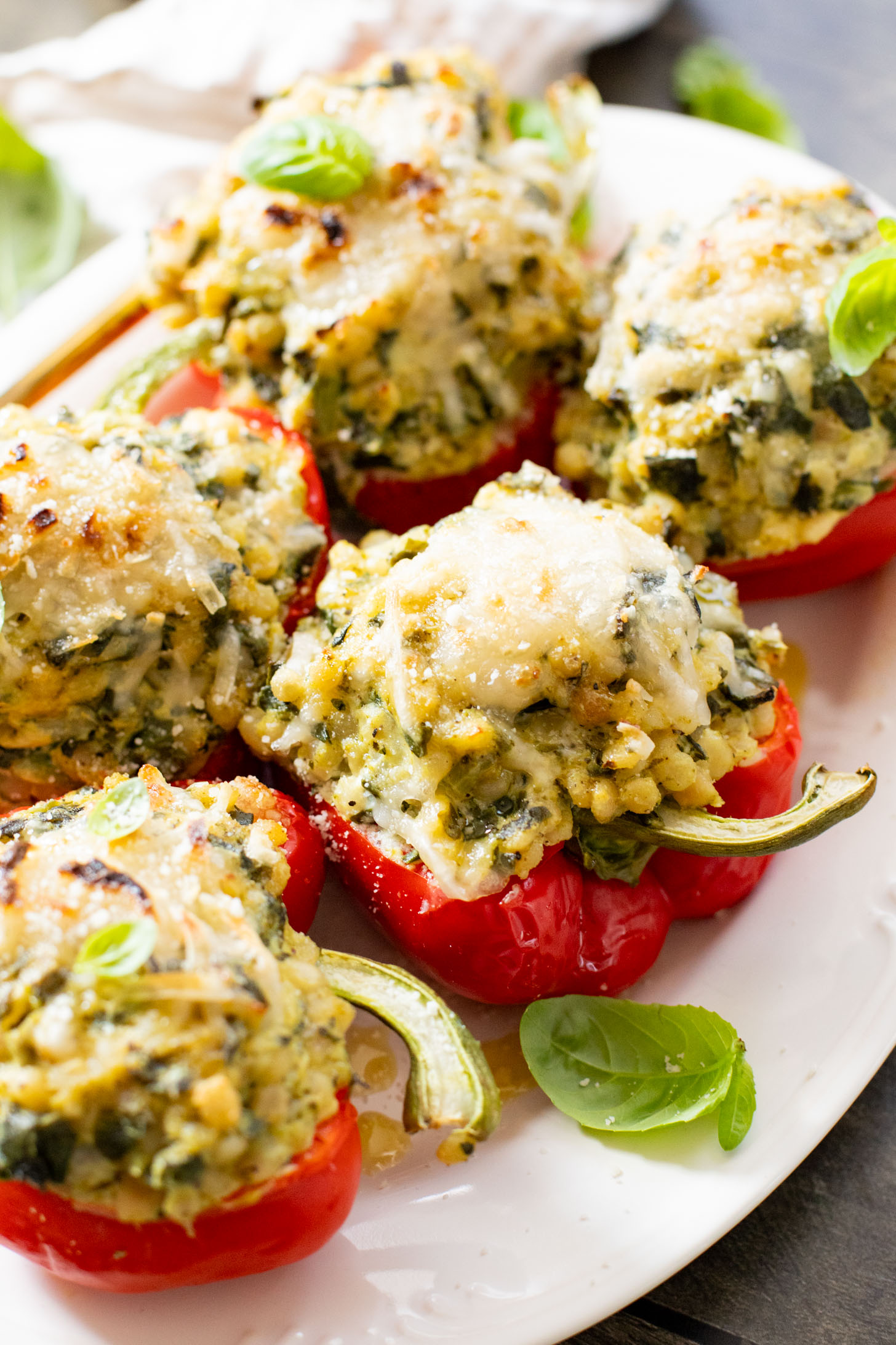 These Ricotta Couscous Stuffed Peppers are dairy-free, creamy deliciousness! A protein-packed vegan dinner idea | ThisSavoryVegan.com