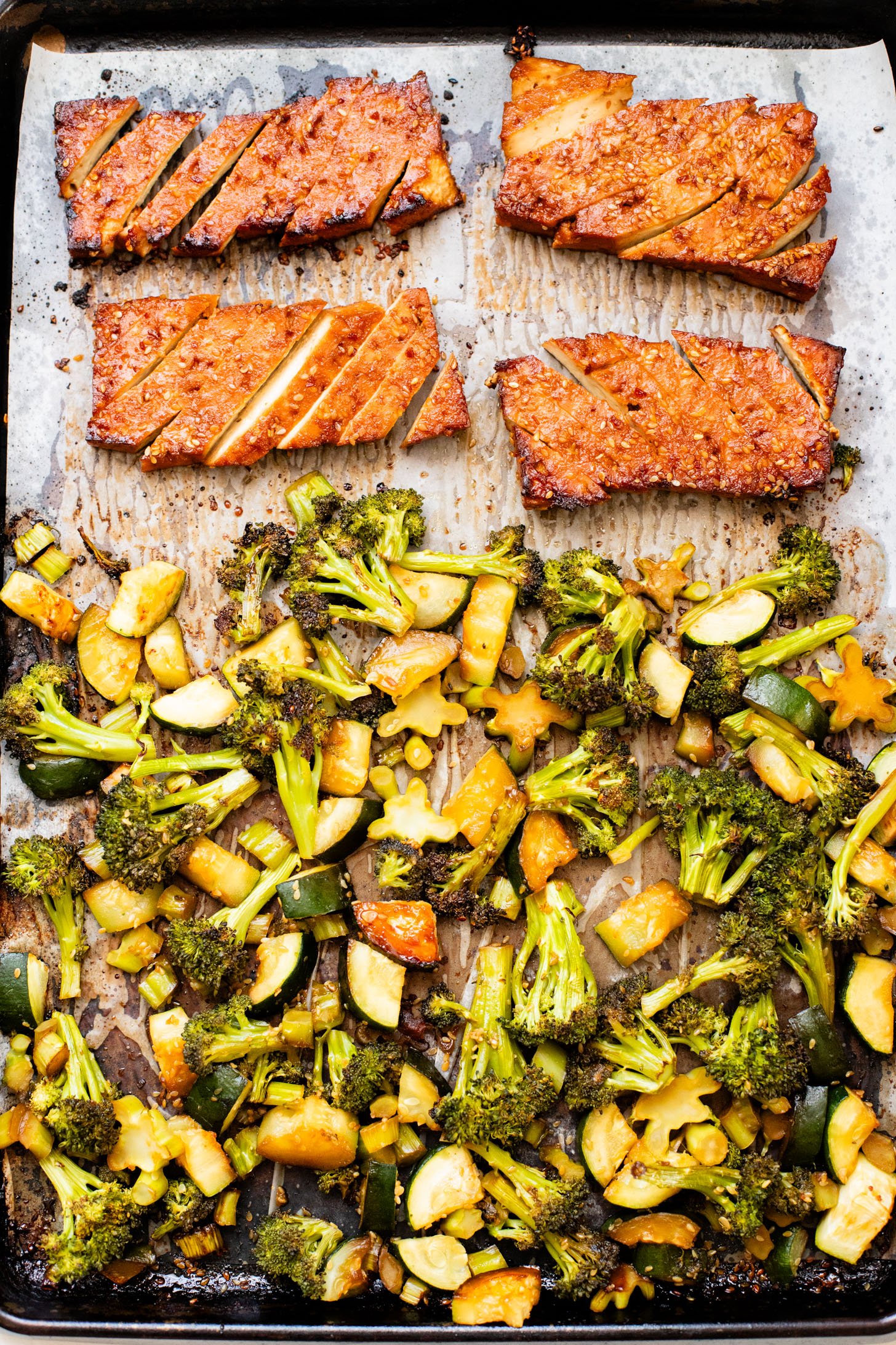 A quick & easy vegan weeknight dinner, this Sheet Pan Soyaki Tofu has marinated tofu & crispy veggies all made on one pan | ThisSavoryVegan.com