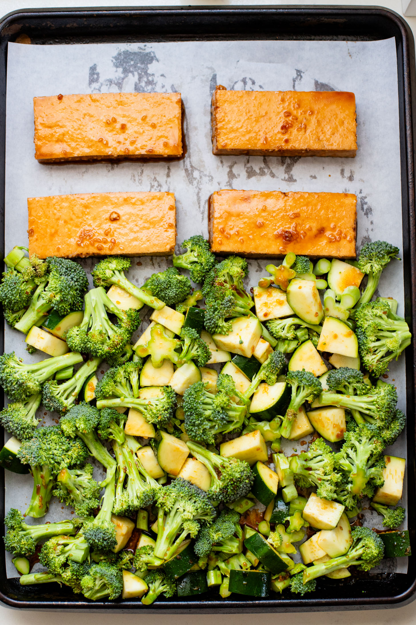 A quick & easy vegan weeknight dinner, this Sheet Pan Soyaki Tofu has marinated tofu & crispy veggies all made on one pan | ThisSavoryVegan.com