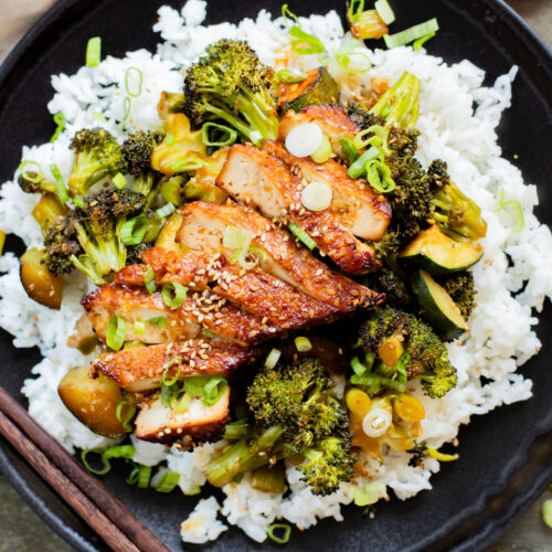 A quick & easy vegan weeknight dinner, this Sheet Pan Soyaki Tofu has marinated tofu & crispy veggies all made on one pan | ThisSavoryVegan.com
