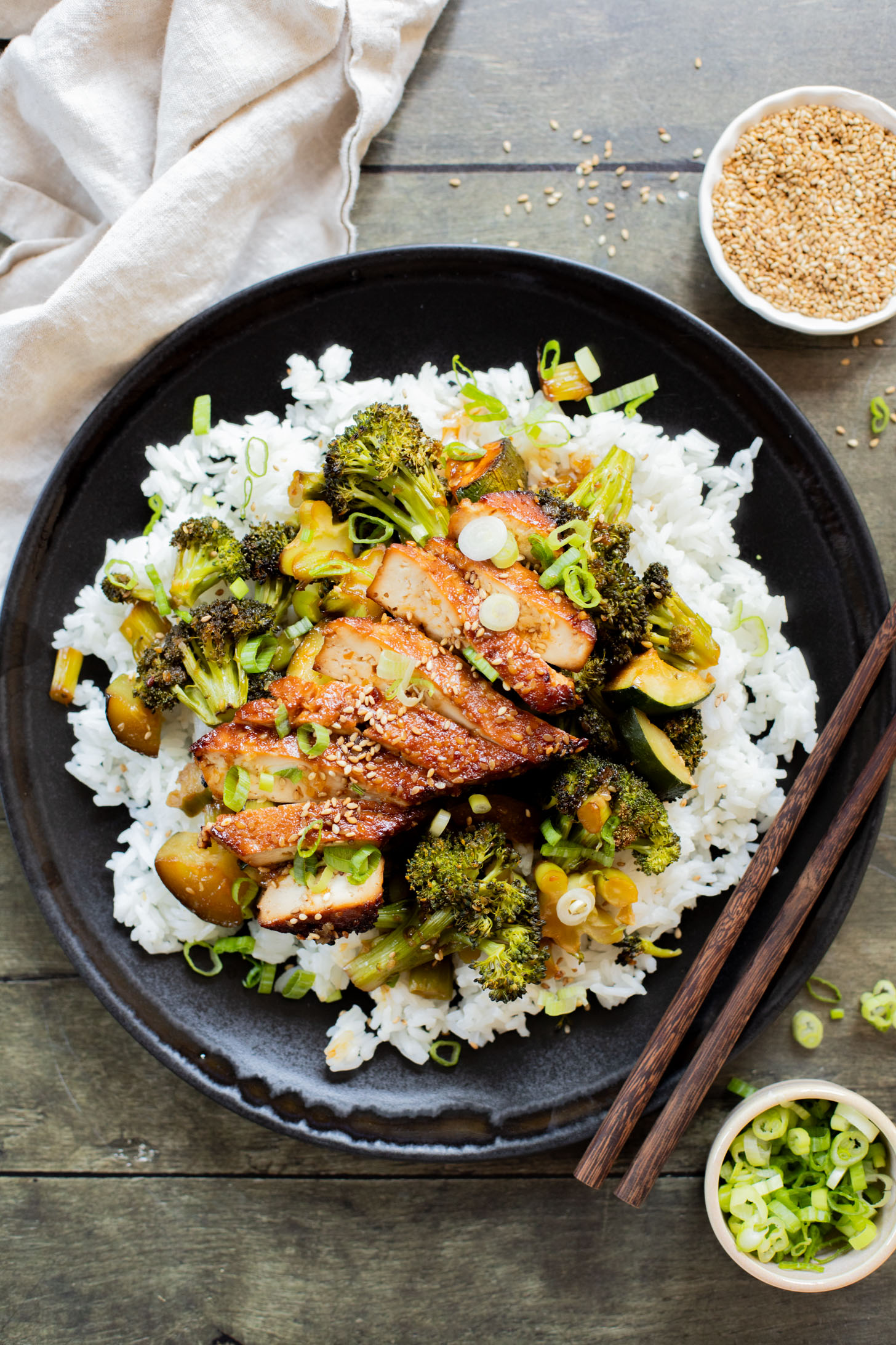 A quick & easy vegan weeknight dinner, this Sheet Pan Soyaki Tofu has marinated tofu & crispy veggies all made on one pan | ThisSavoryVegan.com