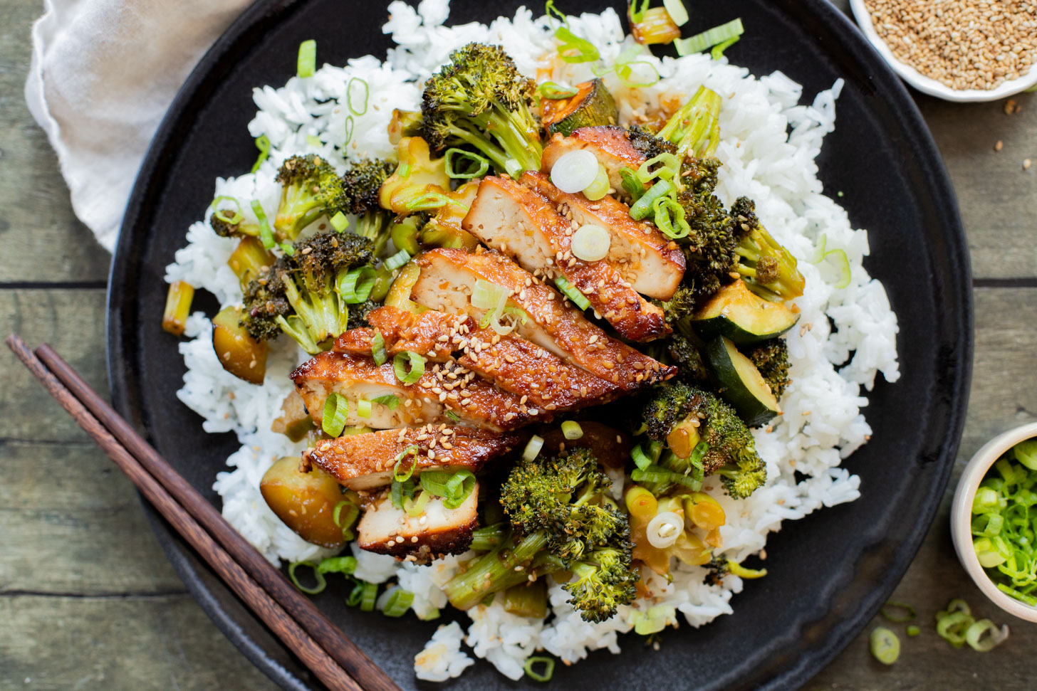 A quick & easy vegan weeknight dinner, this Sheet Pan Soyaki Tofu has marinated tofu & crispy veggies all made on one pan | ThisSavoryVegan.com